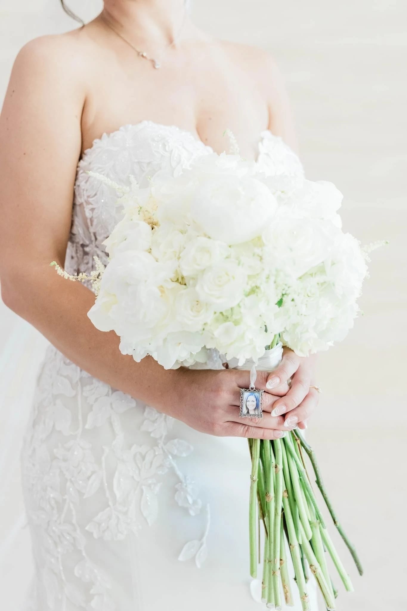 Pure Elgance Pure Elgance - Crisp and Fresh all white floral hand- held bridal bouquet.