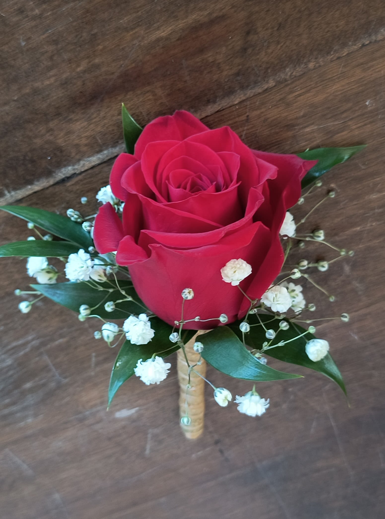 Classic Red Rose Boutonniere - Classic and timeless, the red rose. Red rose, baby's breath, greens and a gold ribbon. 
