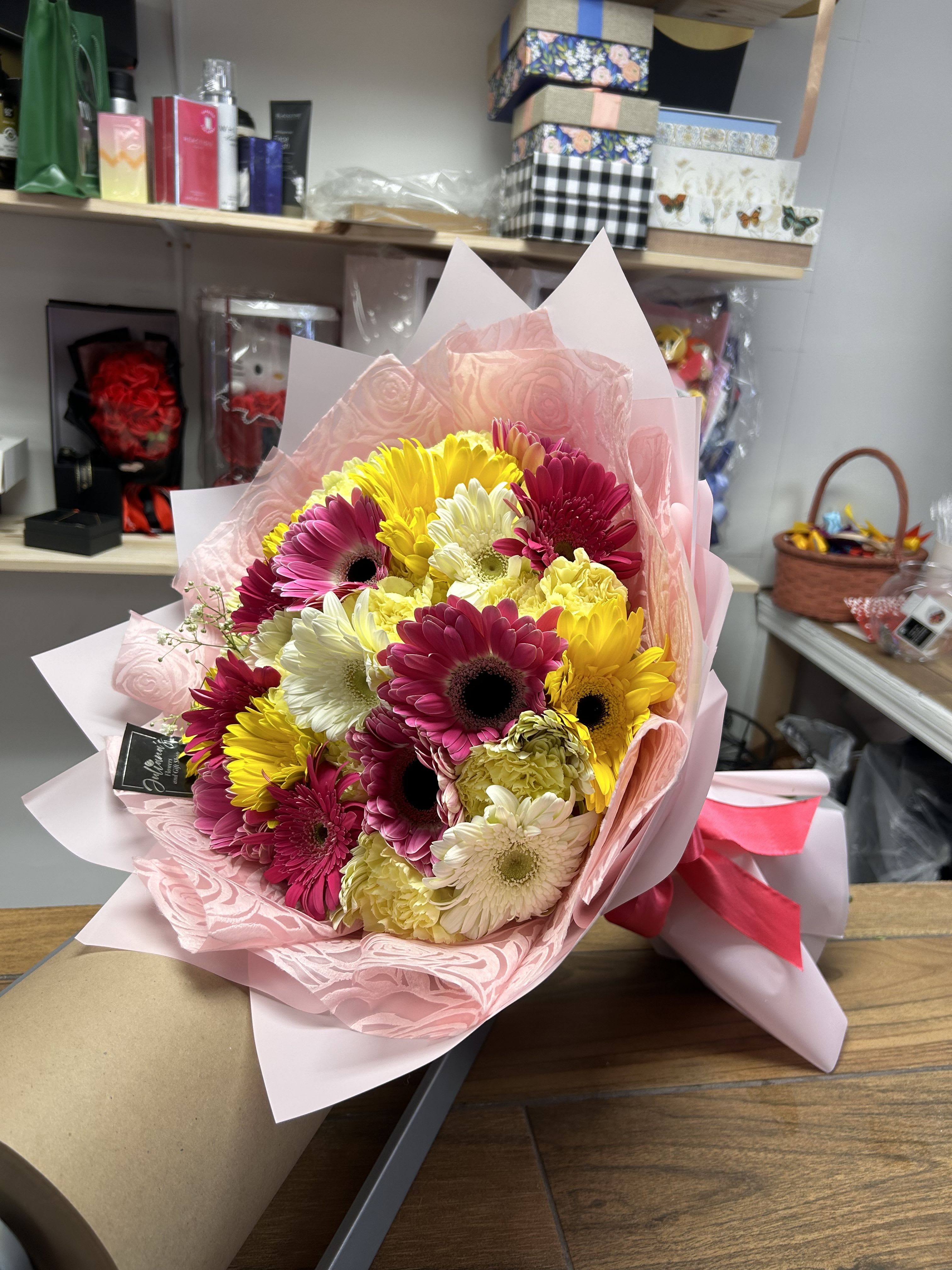 Gerberas bouquet  - Bouquet with 25 gerberas, in seasonal colors, carnations, and finally decorated with Korean paper in seasonal colors