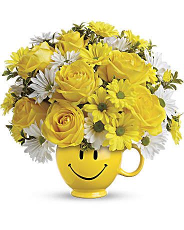 Be Happy® Bouquet with Roses - When you're looking to make someone smile, this happy face mug of roses and daisies is tops. Sure to cheer up everyone from a beloved wife to a busy boss, these are also great flowers for kids.