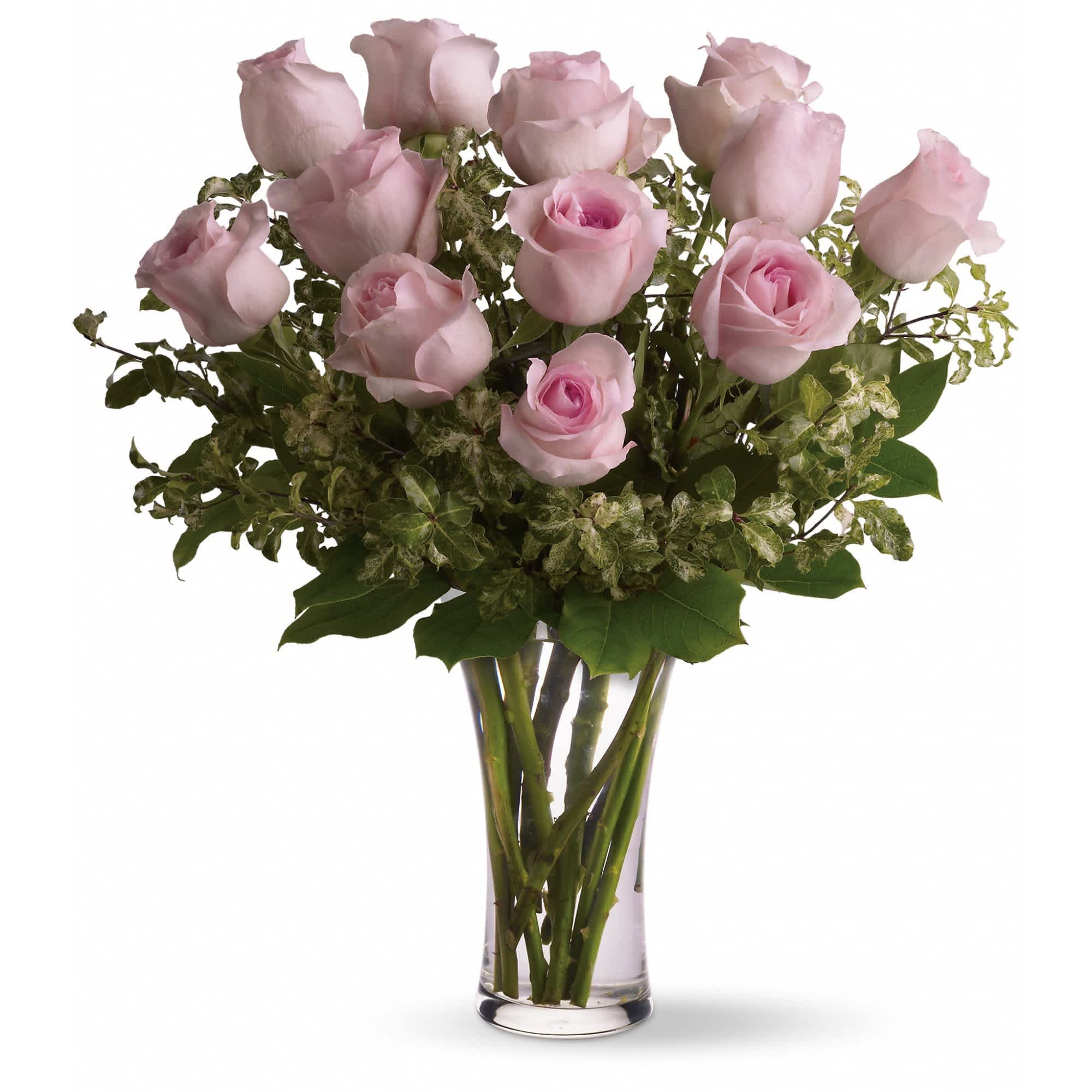 A Dozen Pink Roses - Pretty, pink and perfect. There's nothing like long-stemmed pink roses to show your affection.    A dozen pink roses with variegated pittosporum and salal in a beautiful glass vase.     Approximately 21&quot; W x 25&quot; H    Orientation: All-Around    As Shown : TF33-1