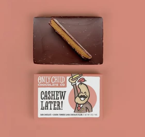 Cashew, Later! Cashew, Later! - A 70% dark chocolate shell surrounds an velvety smooth filling made with Ground Up Classic Smooth almond and cashew nut butter, milk chocolate and Diaspora Co’s joyous ground Turmeric. Say “cashew later!” to all your worries while you enjoy this lovely bar.