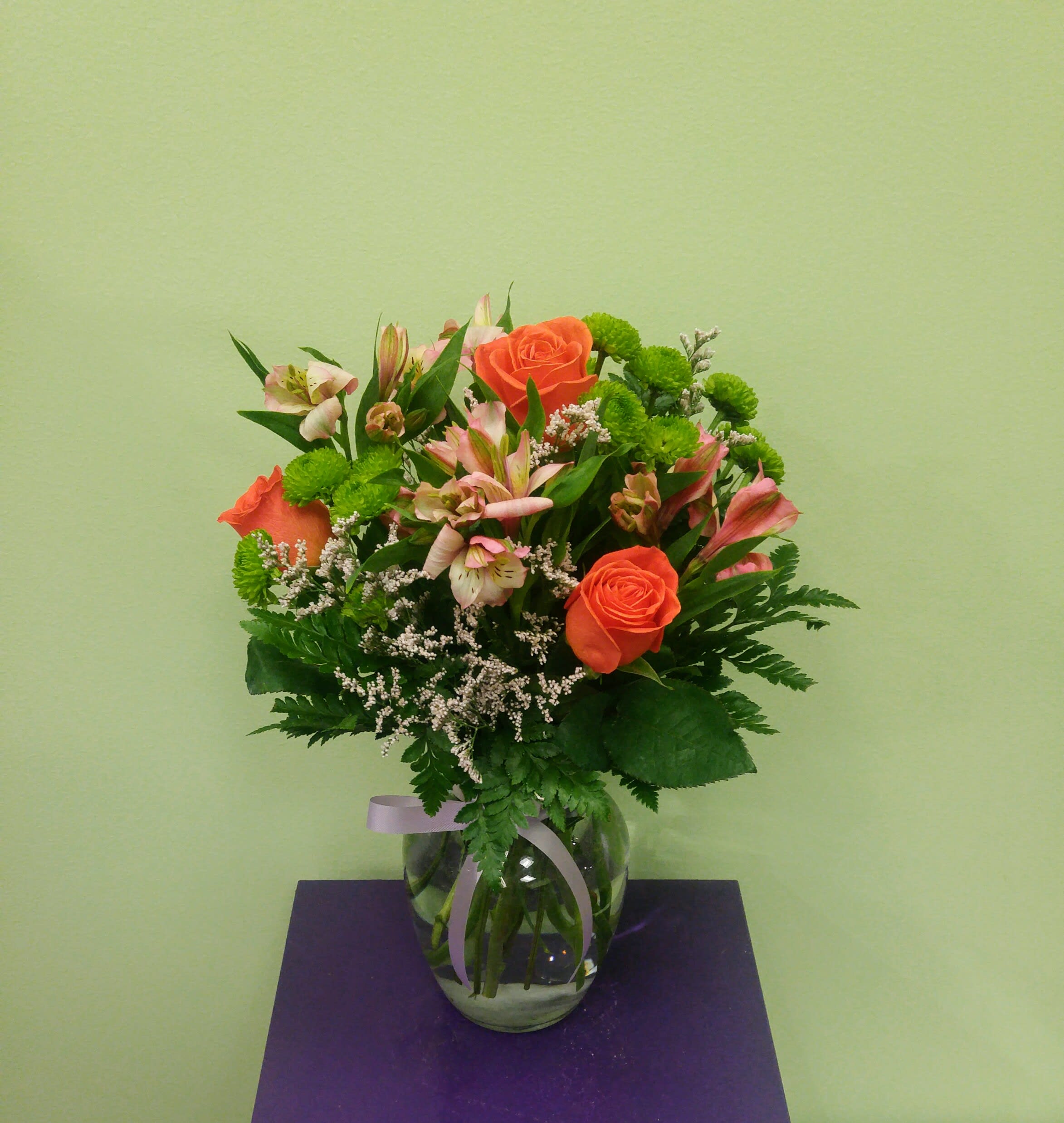 Sunkist Sunkist - A bright, cheerful, and joyous colorful bouquet that is full of long lasting flowers. Our bright orange roses pop like the sun and will shine on to the one you send them to.