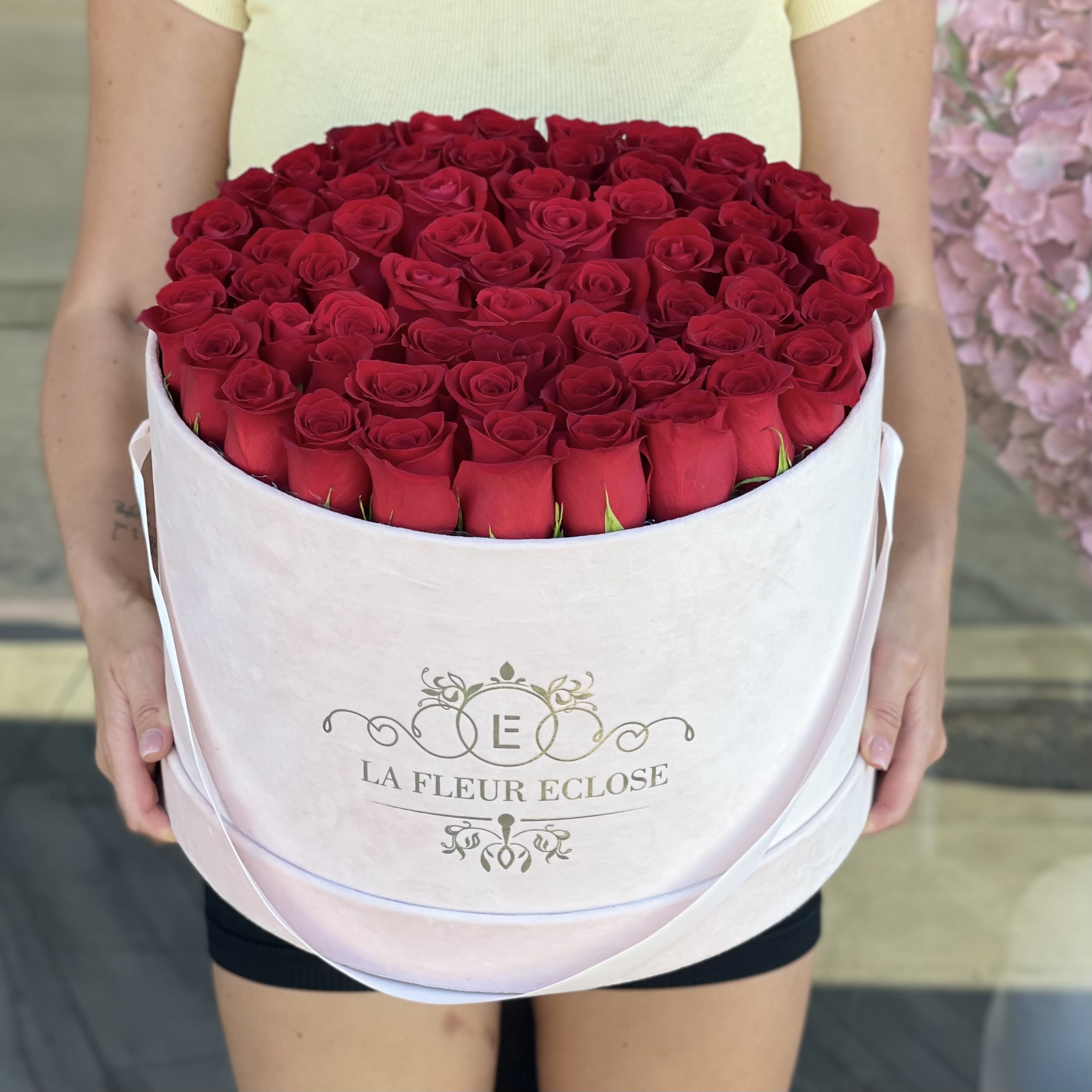 Happily After V - 68-70 Fresh Red Roses in a pink velvet box 