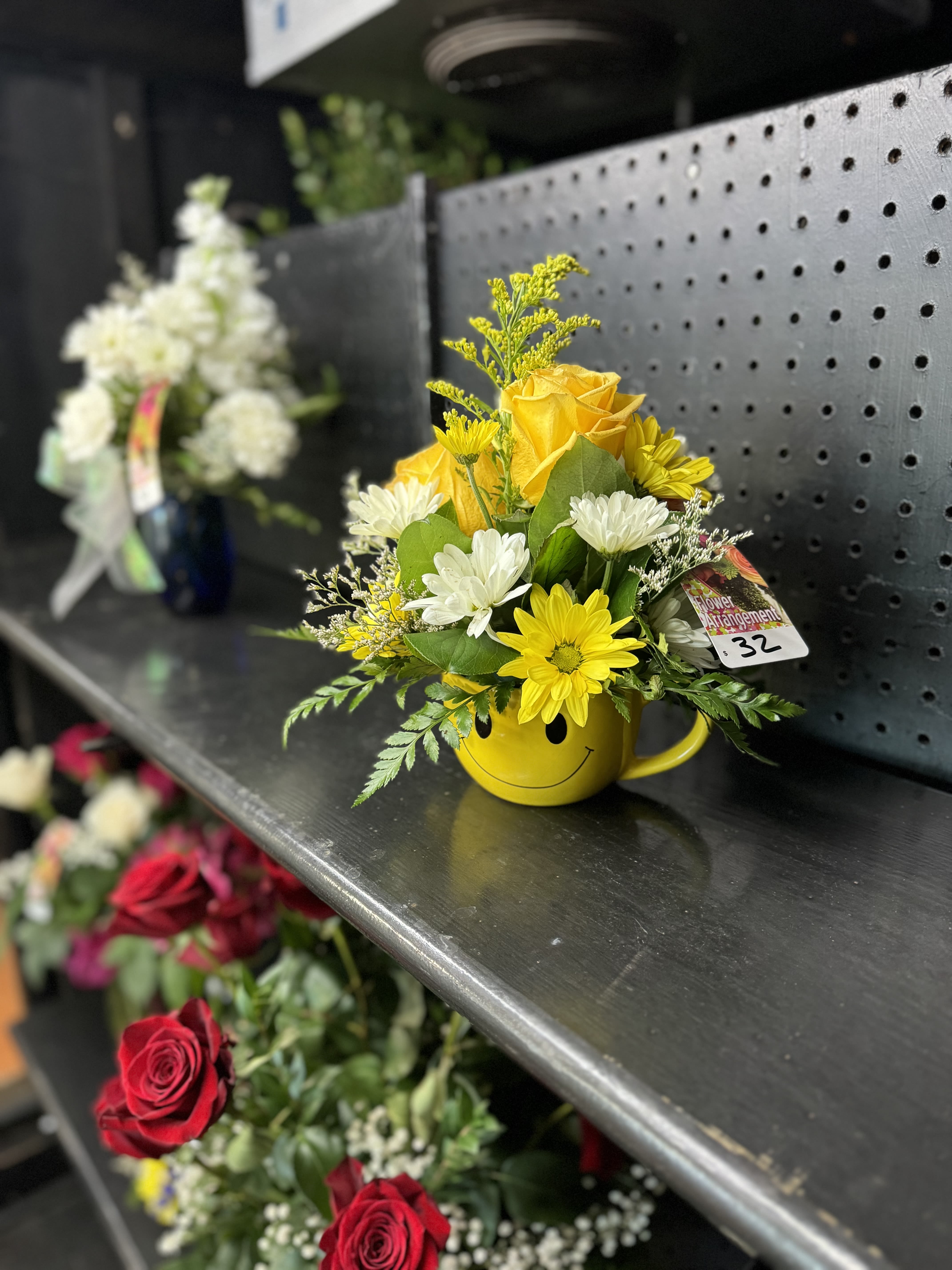I got my eye on you - Emily face coffee cup with flower arrangement 
