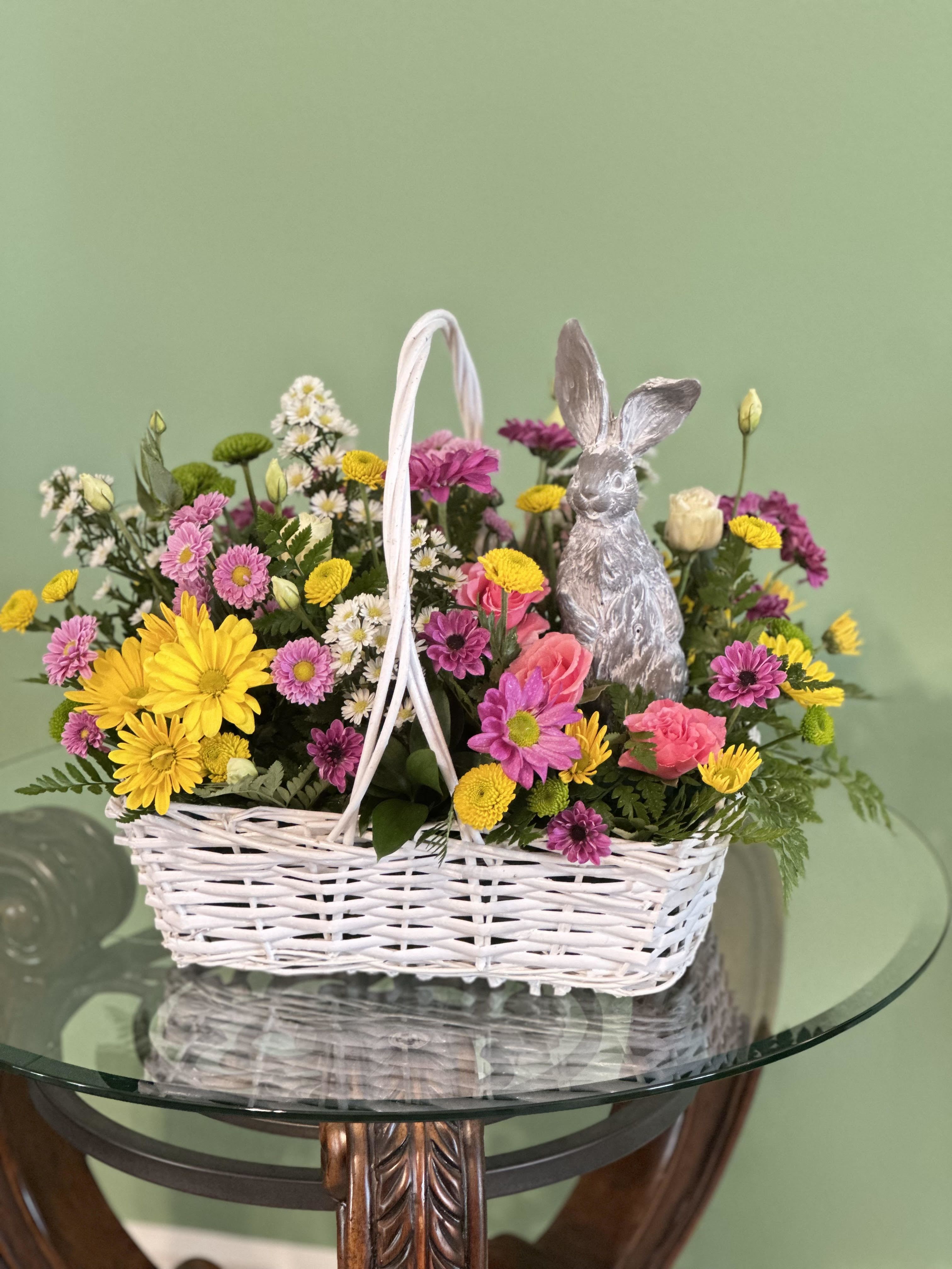 SomeBunny Loves You - A Charming Basket Filled With A Vibrant mix Of Flowers Accompanied By a Keepsake Bunny.  Prefect For Your Easter Celebration 