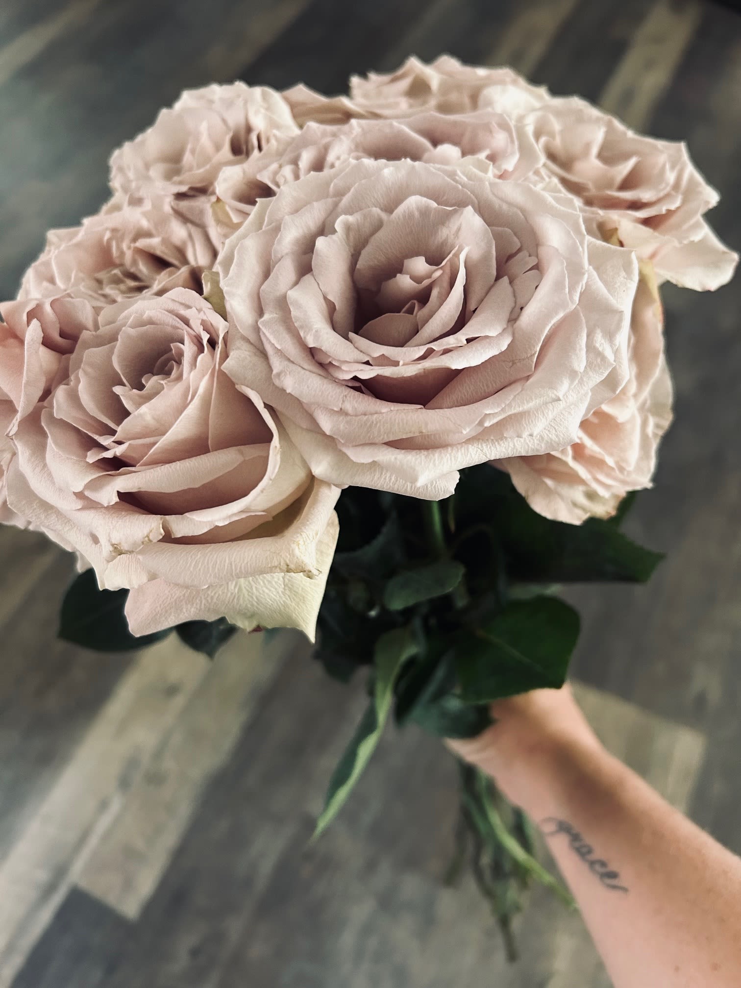 1 Dozen Ribbon Tied You Pick Color Roses 1 Dozen Ribbon Tied You Pick Color Roses - 12 fresh cut roses of your color choice delicately arranged and tied with ribbon of designer's choice.