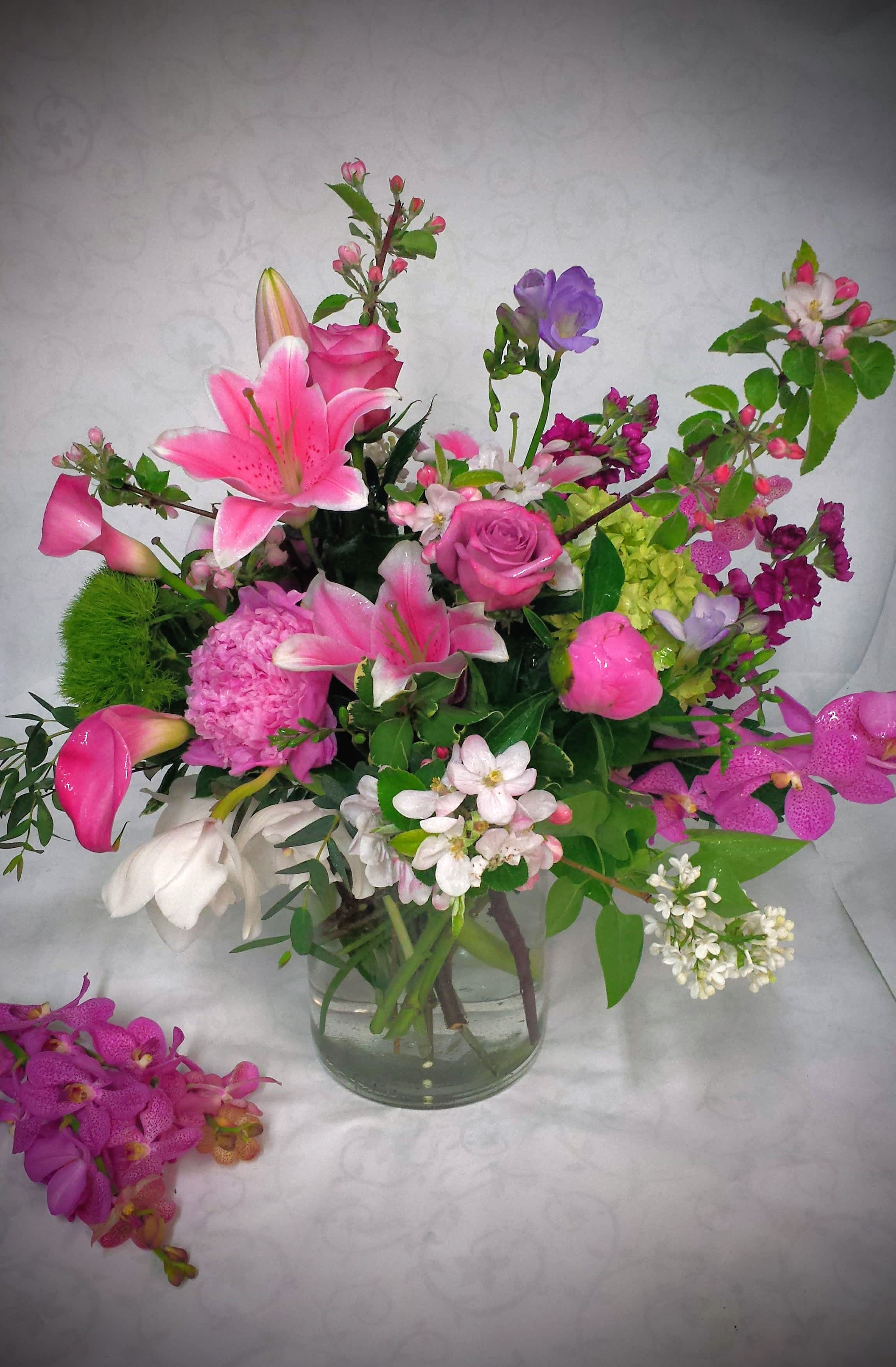 Sidney Sidney - We don't know which part of this bouquet will captivate you first, the look or the fragrance. For Mother's Day only- Peonies, lilac, appleblossoms, roses, call lilies , hydrangea are just o few of the premiums that make up this amazing display.