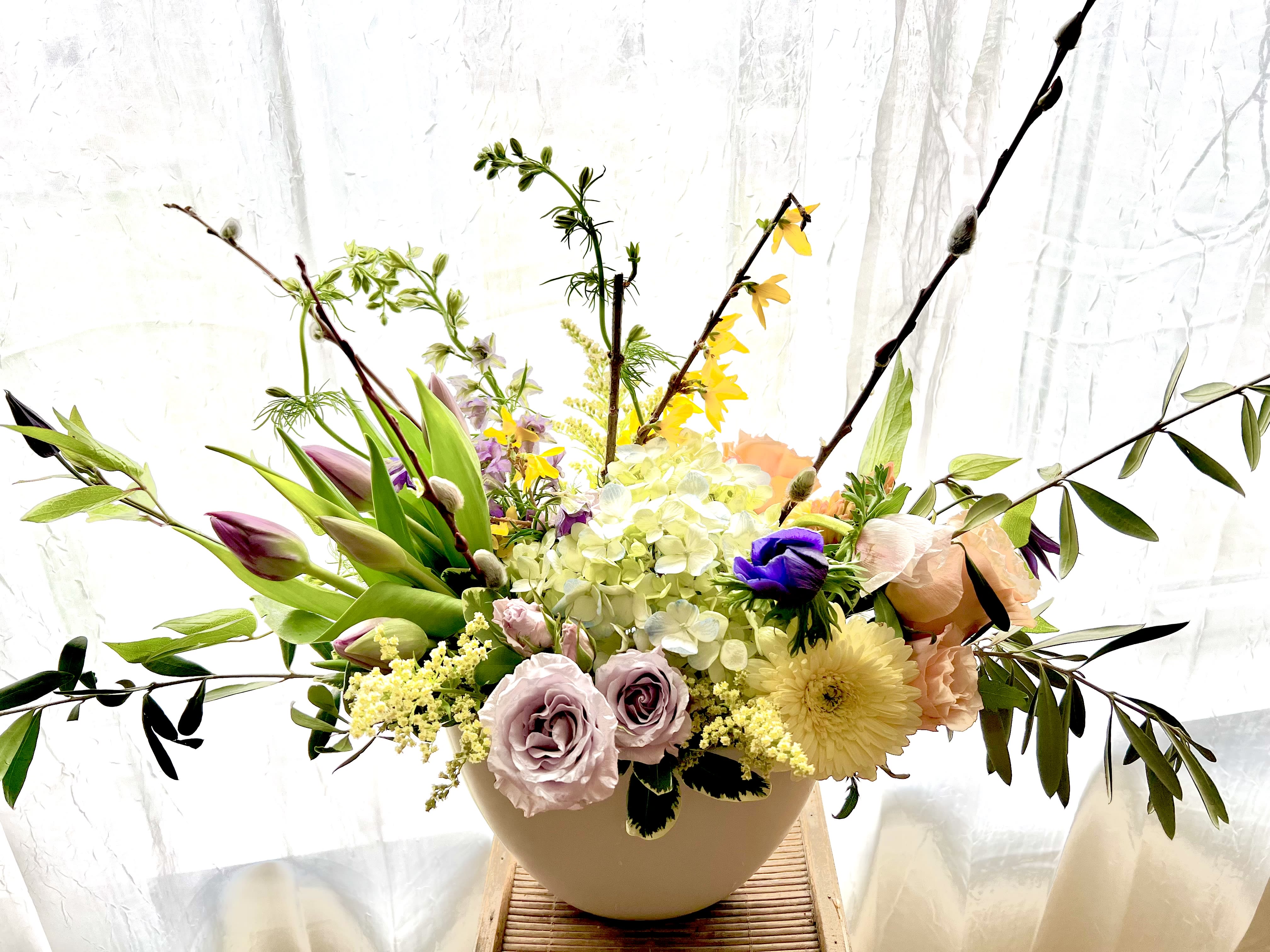 Dancing into spring Dancing into spring - An artistic blend of soft gentle colored blooms welcomes spring
