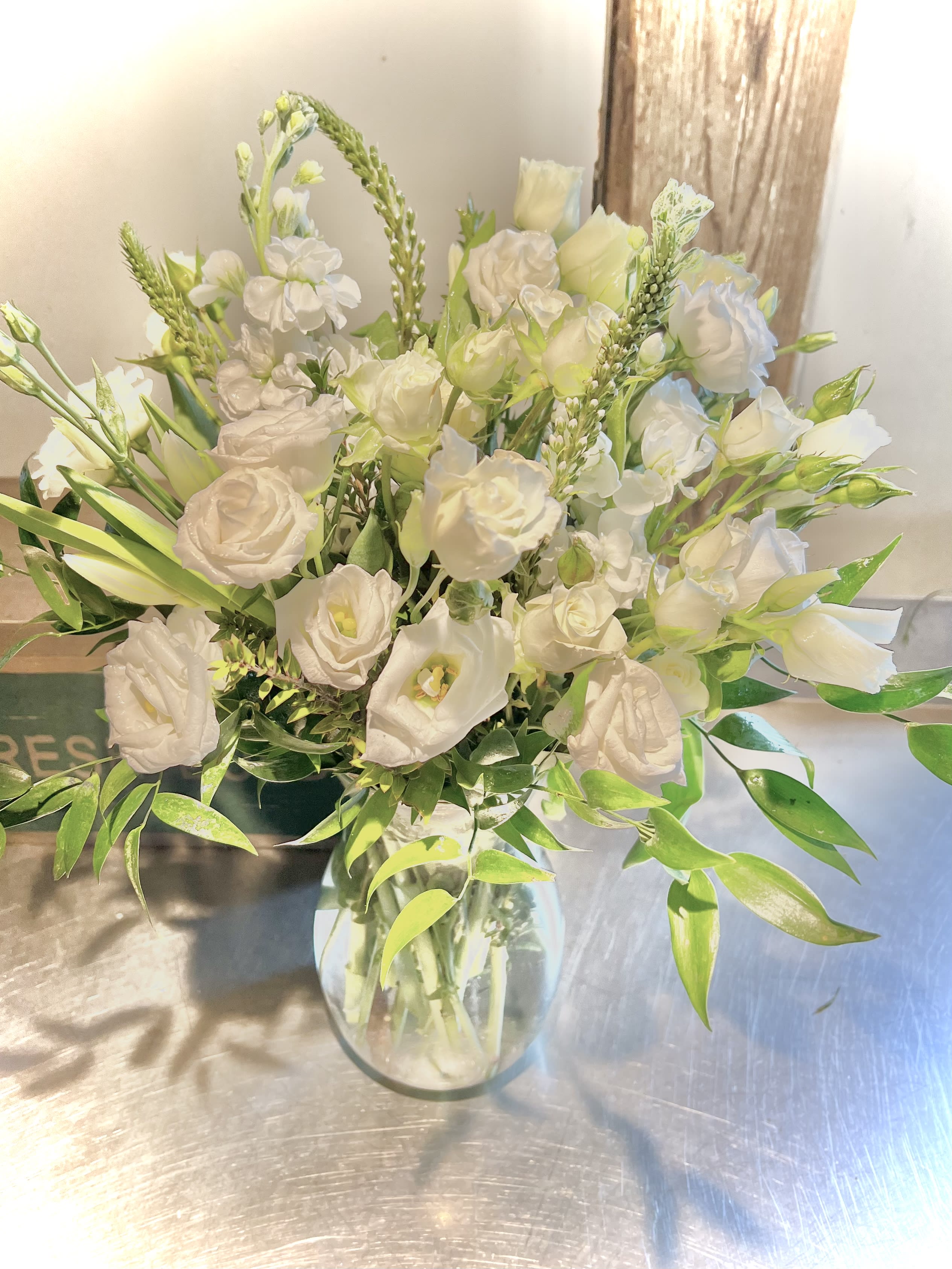 Simplicity Simplicity - A simple display of white blooms arranged in a clear glass vase