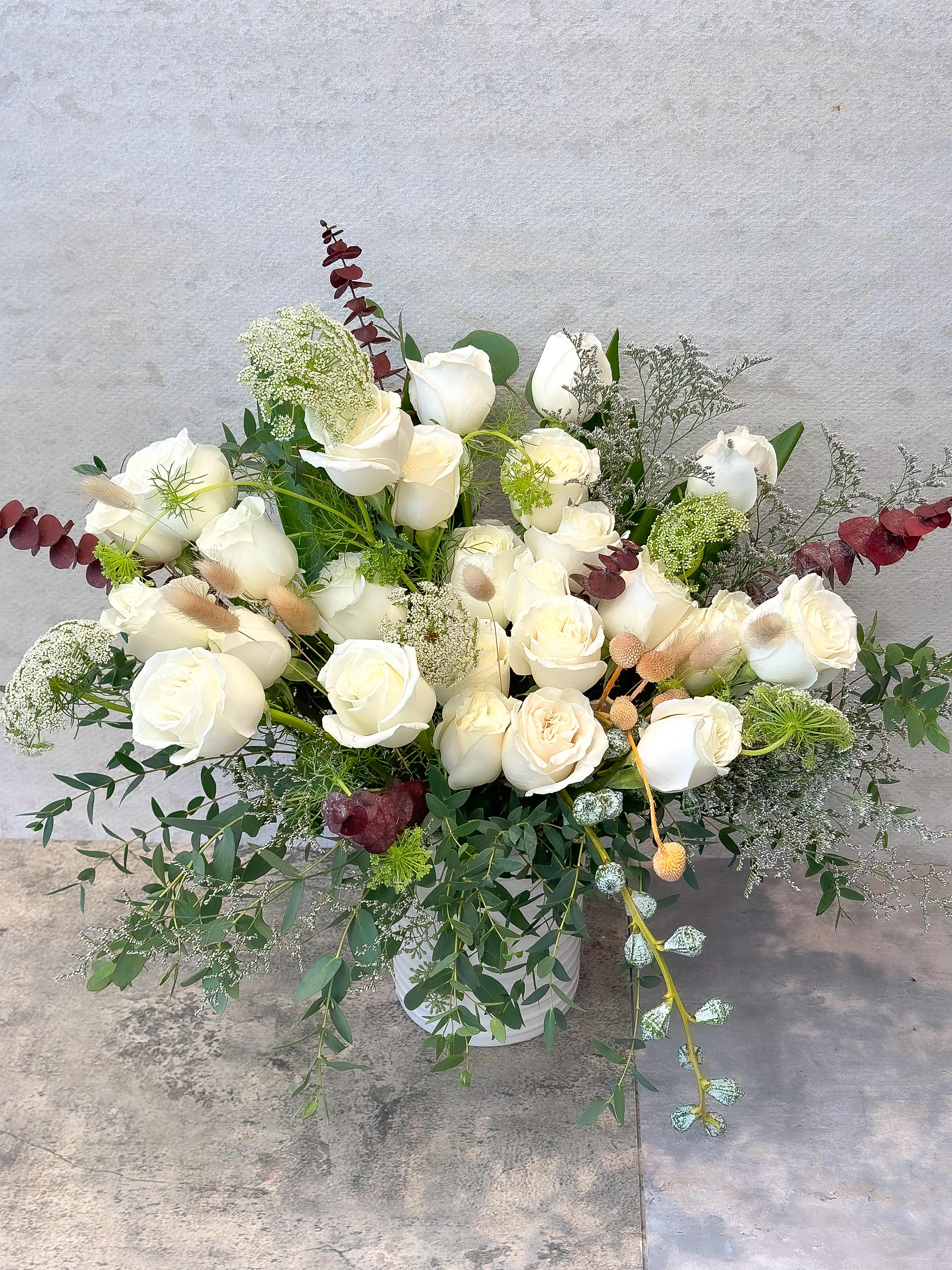 Premium White Roses in Vase - Standard - Your order will be arranged approximately as shown on our website.