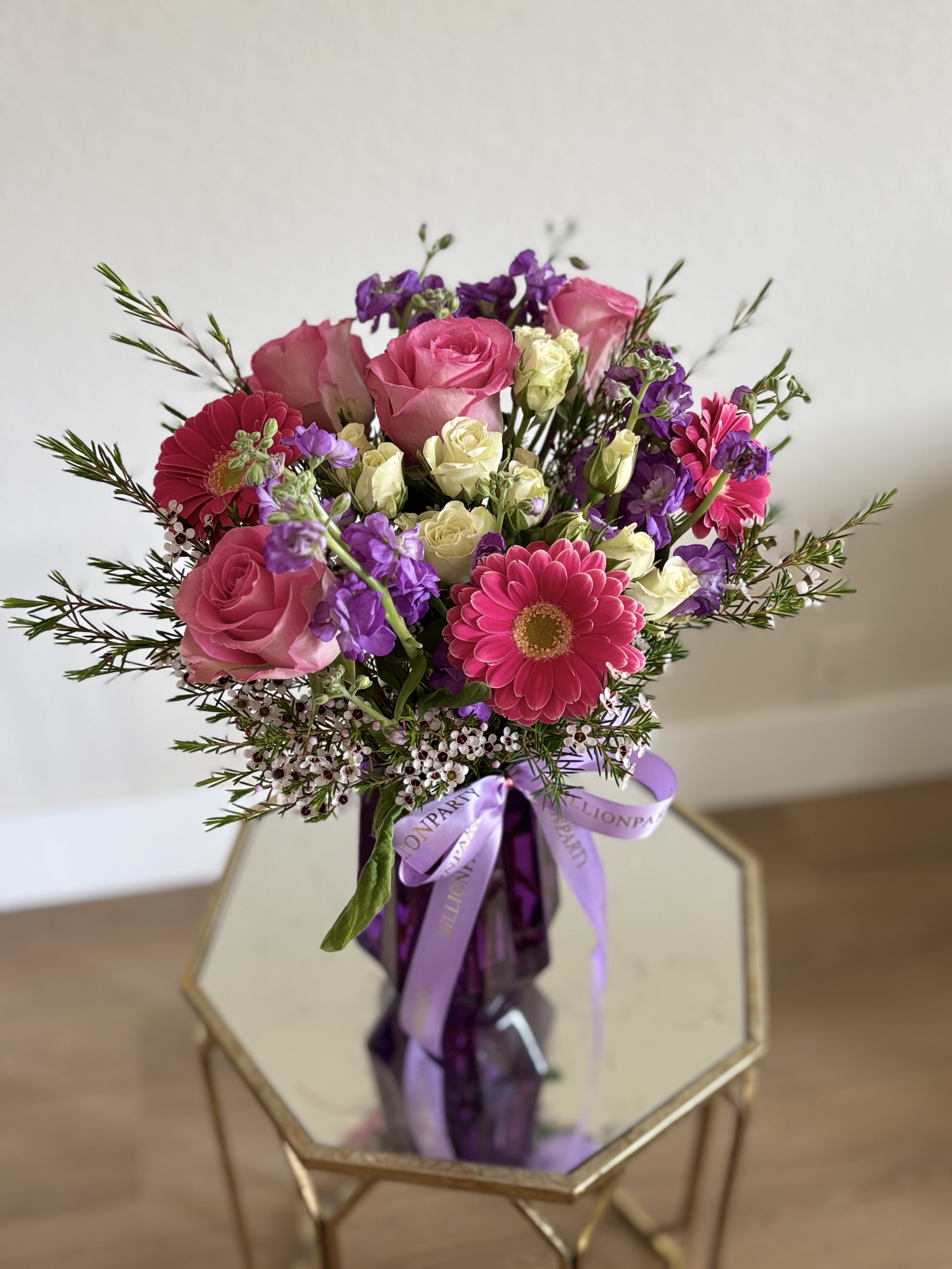 Touch of love - Make an unforgettable impression on Mother's Day with this bouquet with shades of pinks &amp; purples! She'll forever treasure its hand-blown, one-of-a-kind crystal purple glass vase, featuring soft ombre shades of purple and lavender ribbon 