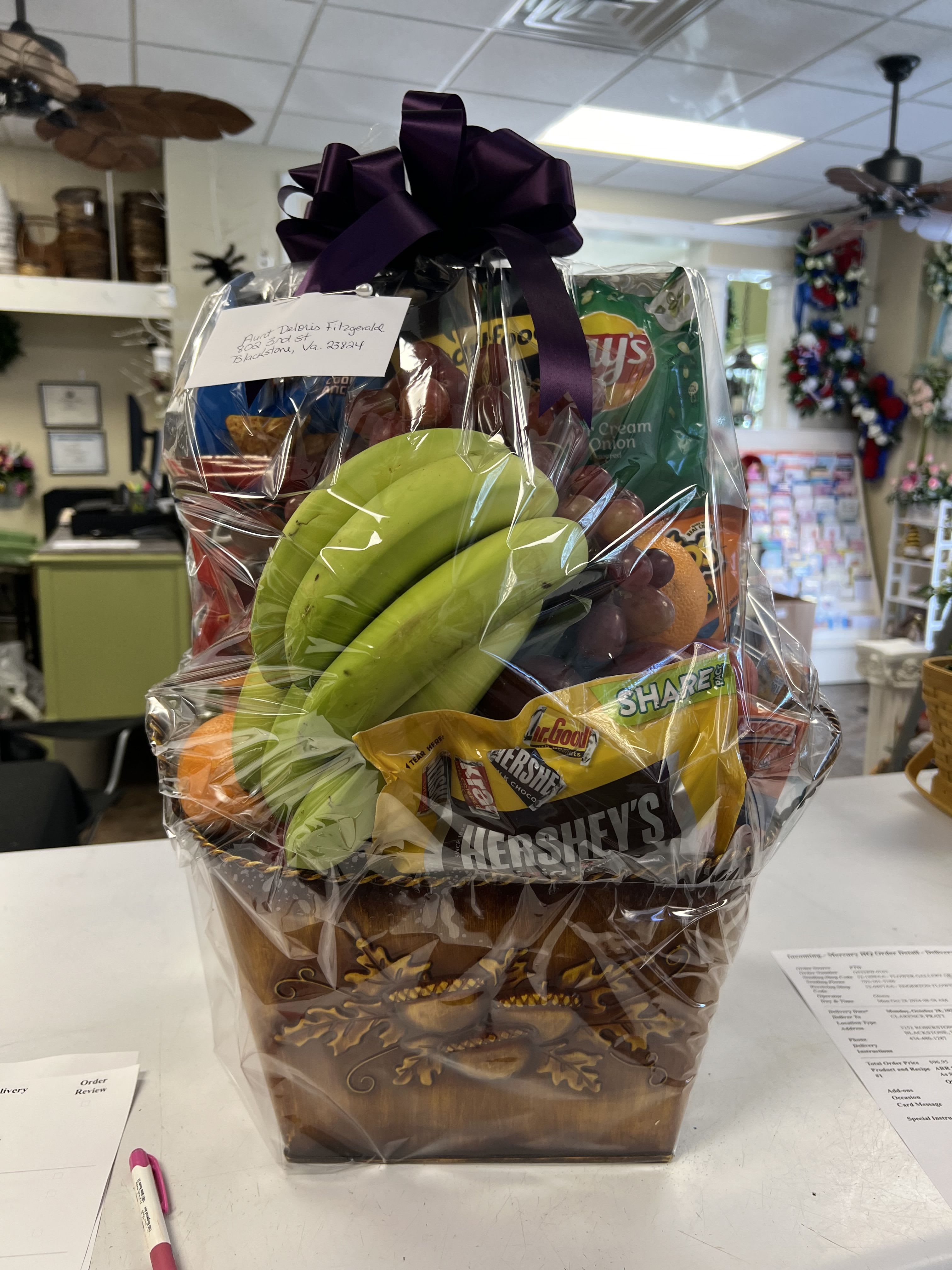 Fruit and snack Basket - A basket of seasonal fruits with snacks