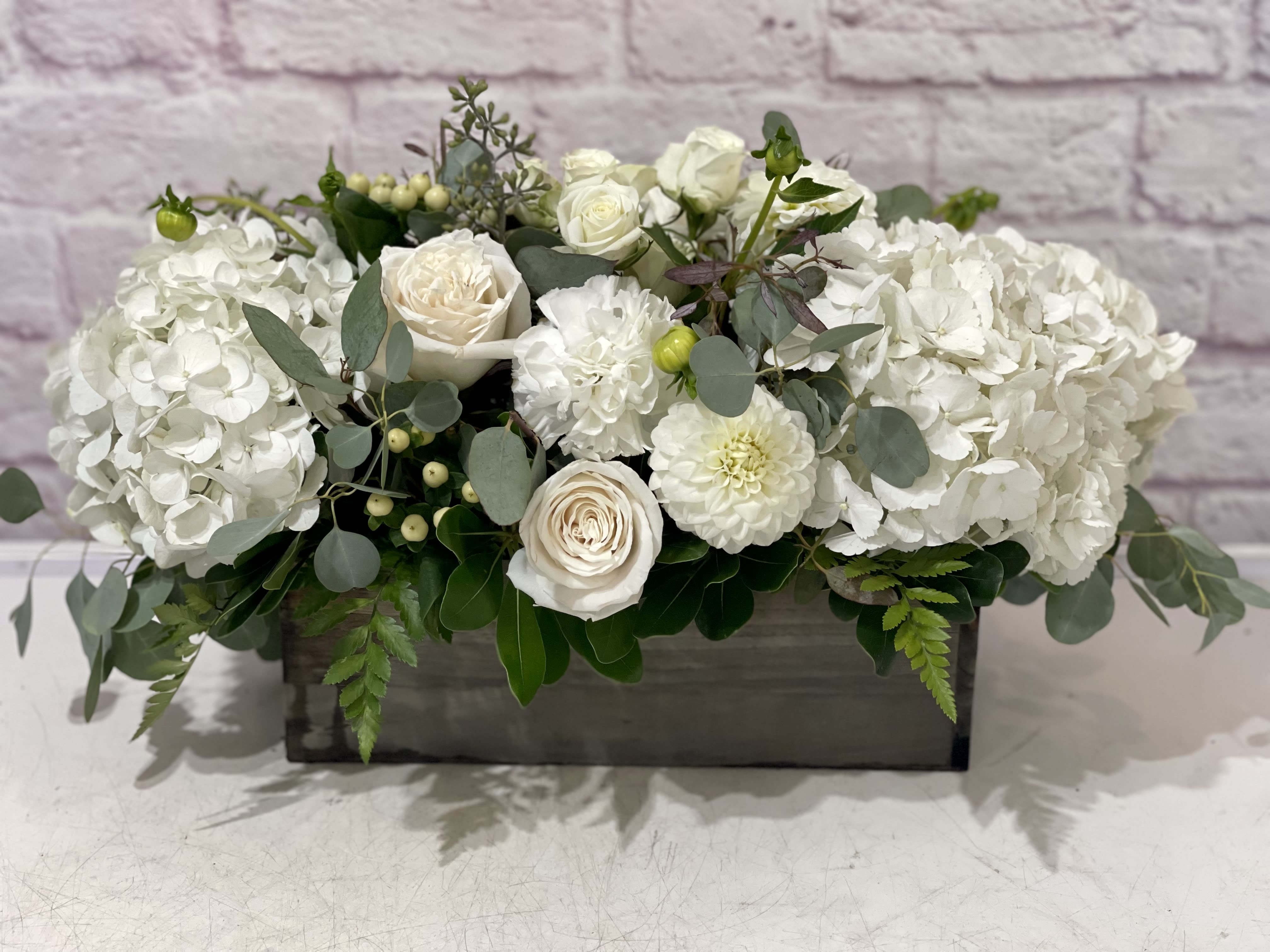 Always On My Mind Always On My Mind - Luxurious white seasonal blooms in a cedar box. Classic, simple, stunning. Perfect for birthdays, "get well soon," new baby, sympathy, romantic gestures, and "Thank you." Available for delivery in Seattle, Bellevue, Shoreline, and surrounding areas. Available for delivery in all neighborhoods in Seattle including Magnolia, Ballard, Fremont, Downtown, Queen Anne, Crown Hill, U District, West Seattle, International District, Capitol Hill, Pioneer Square, Beacon Hill, Columbia City, Georgetown, etc.