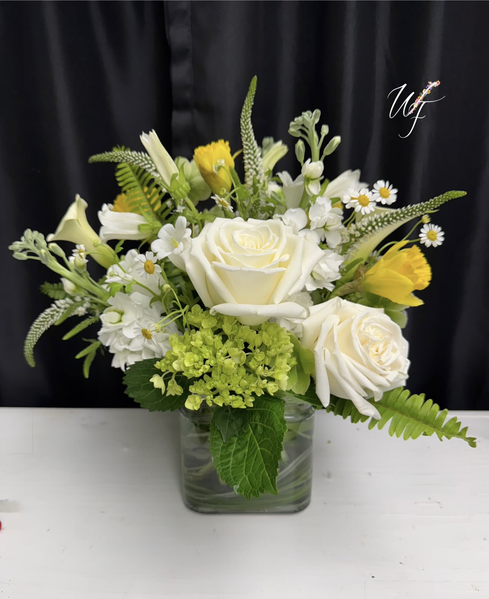 Morning light - Whispy whites and yellows designed sweet and compact in a lined low clear case. 