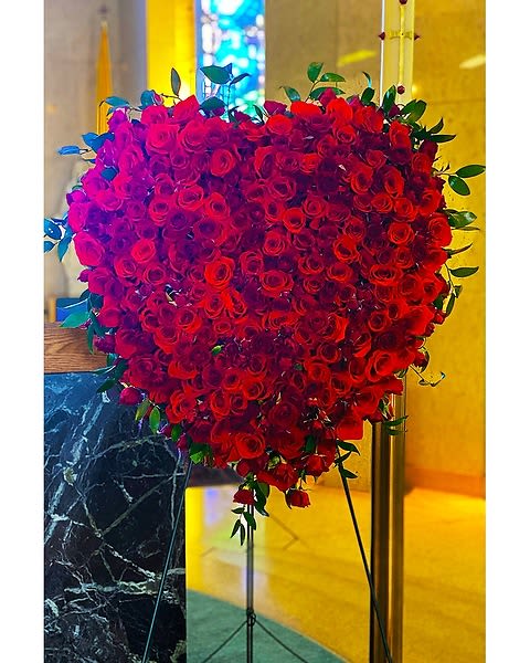 Solid Rose Heart - This solid rose heart is the perfect way to honor someone you love. Constructed of Ecuadorian spray and single stem roses, this heart will last for days to come. NOTE: If a different color rose is desired, please enter that in Special Instructions, or contact the store after placing your order. If nothing is entered, the rose will be made of red roses. Please allow 72 hours for construction of the heart.  All prices in USD ($)