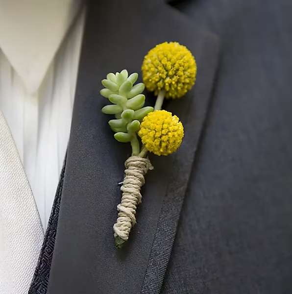 Designer Choice Boutonniere or Corsage - Sometimes you just need to leave the design decisions up to our experts! Choose either a Designer choice (Boutonniere or Corsage) in a contemporary or traditional style. Specify the preferred colors of the flowers or elements such as ribbon in the comments section of this order form and even tell us what you are wearing. We will come up with the perfect addition to your outfit based on what is seasonal and current! You won't be disappointed! All Boutonnieres and Corsages should be ordered a minimum of 3 - 5 days prior to your event. For needs sooner than that please call the store at 858-454-0146 to ensure availability. NOTE: WRIST CORSAGE BEADED AND CRYSTAL BANDS SOLD SEPARATELY. PLEASE CHOOSE PREFERRED BAND AND ADD TO ORDER.  All prices in USD ($)
