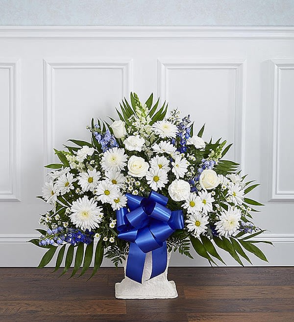Heartfelt Tribute™ Blue &amp; White Floor Basket Arrangement - Offer the peace and tranquility that comes from classic blue and white flowers. Our elegant floor basket arrangement, handcrafted by our caring florists with pristine white and blue blooms, is a tasteful gesture perfectly suited for the funeral home or memorial services.