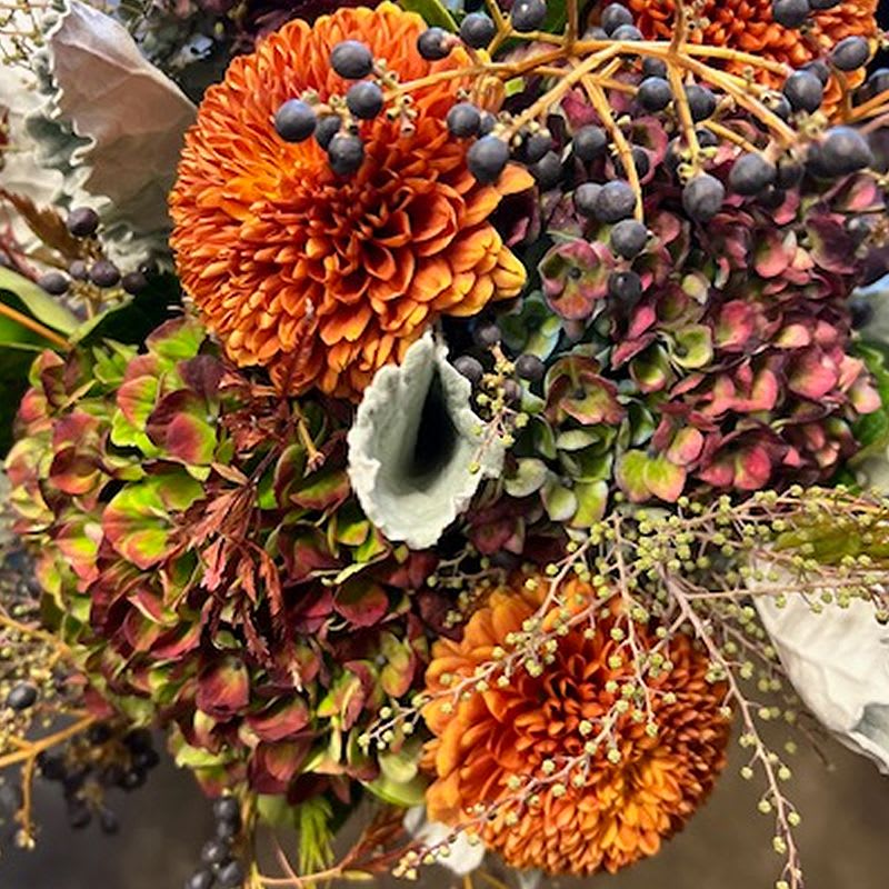 Autumn Autumn - Hydrangea and Chrysanthemums wrapped in mesh ( Hand-tied). If you need a vase please choose a vase by going to add product( Standard vase for standard arrangement, Deloux vase for Deloux arrangement, Premium vase for premium arrangement).