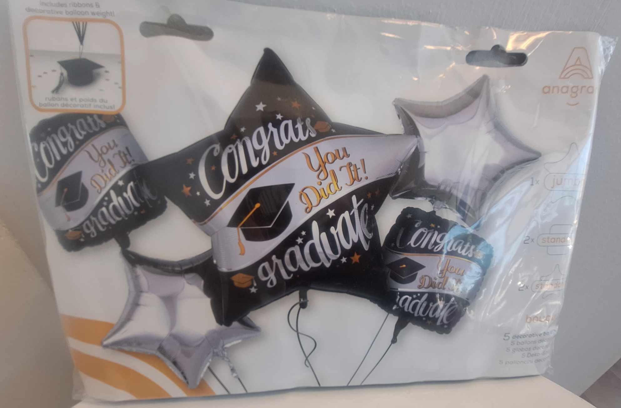 Congrats Graduation Bundle Mylar Balloons Congrats Graduation Bundle Mylar Balloons - 5 balloon set to add to any floral arrangement, box of chocolates, gift bag 1- Jumbo script mylar balloon 2- 18in script mylar balloon 2- 18in silver star mylar balloons