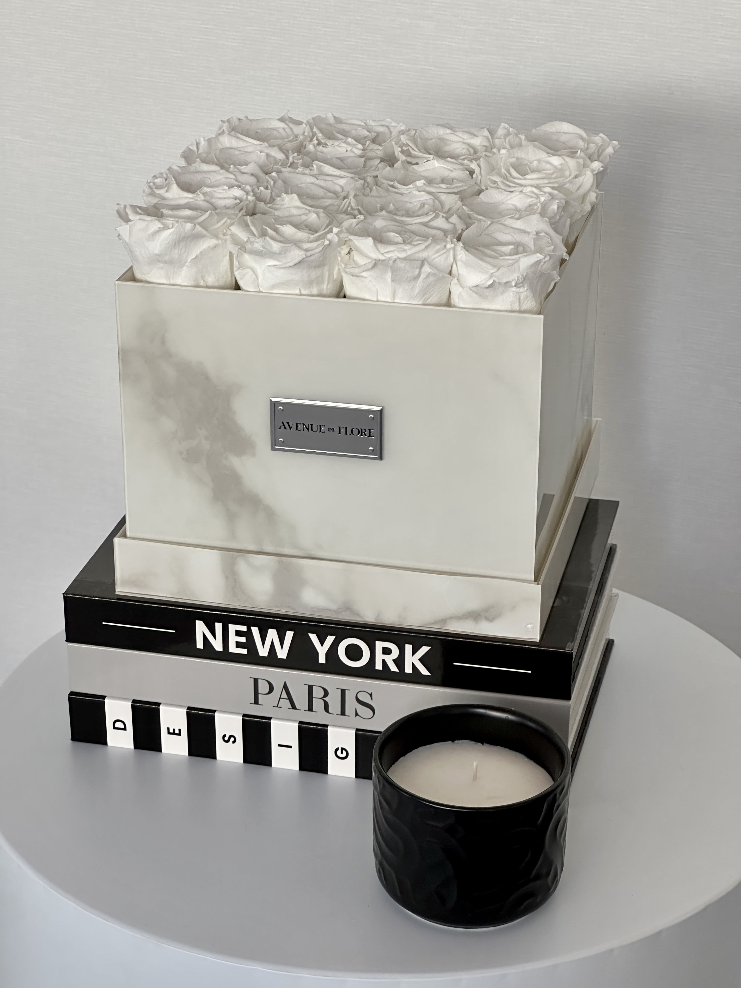 White Marble Square Box - White Preserved Roses - Discover timeless elegance with our exquisite White Marble box adorned with 16-20 white roses that last for 1-3 years.  Perfect as a unique gift or a statement piece for your home decor.   PRESERVED ROSES.