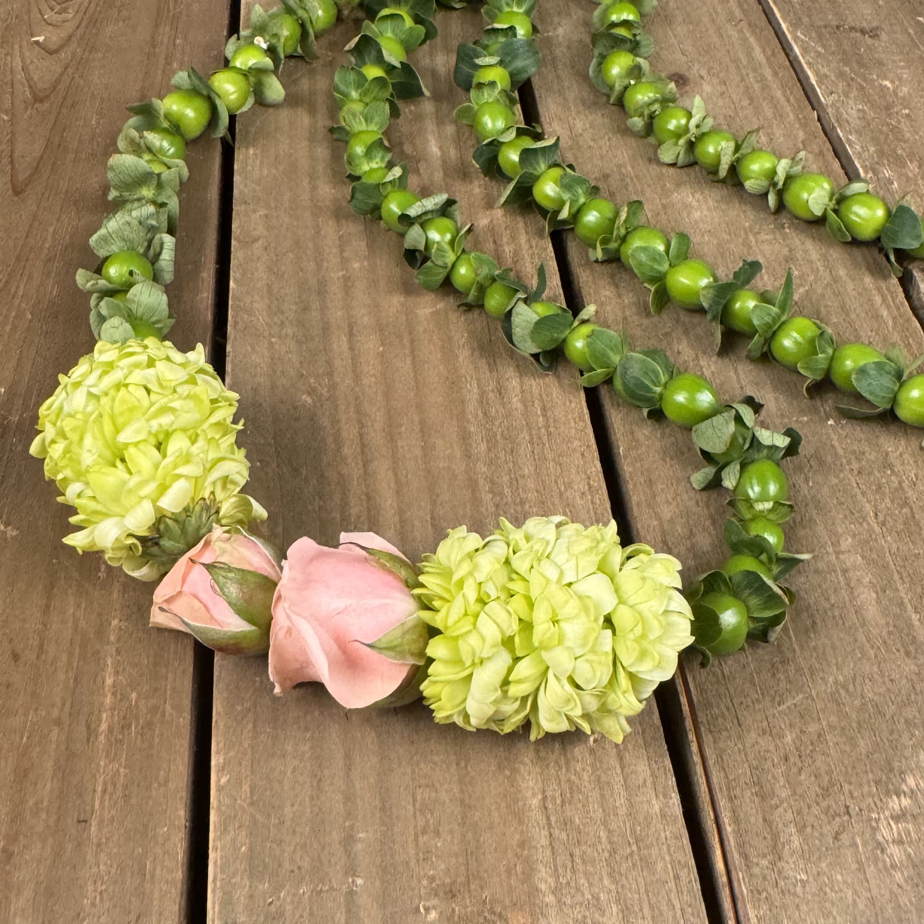 Hypericum Lei - This whimsical version of a lei is available in several colors. Call to inquire. Perfect for Father's Day.