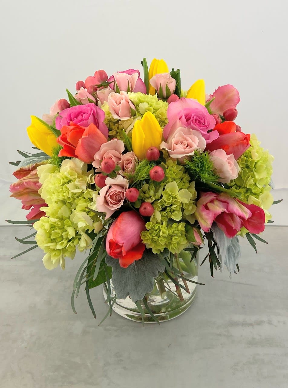 Spring Fling Bouquet - Share the hopeful and joyous spirit of the season with the &quot;Spring Fling&quot; bouquet!  Featuring one dozen locally grown tulips, hydrangea, roses, berries and eucalyptus it's an uplifting bouquet sure to bring a smile to all who receive it.  