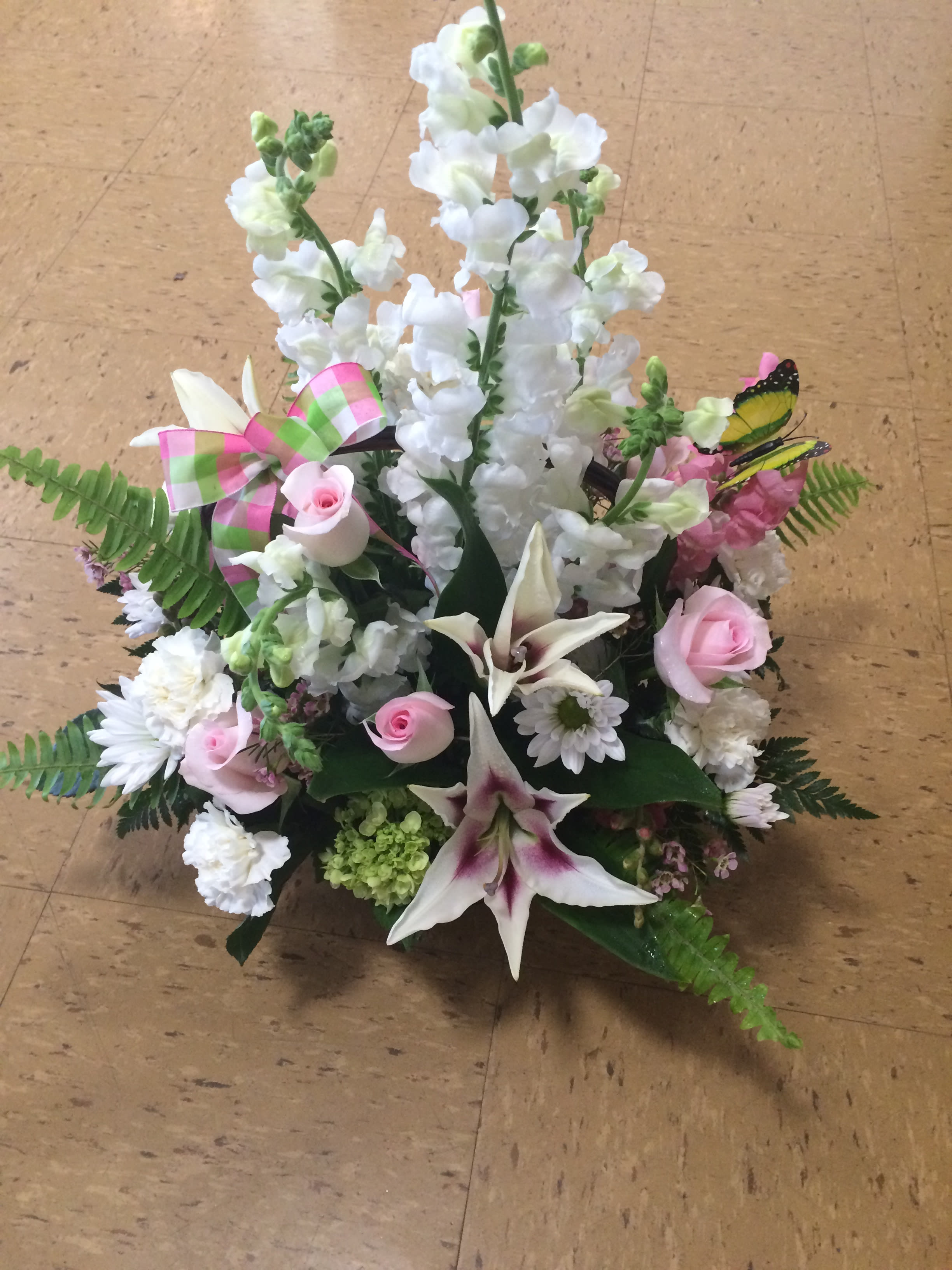 Meadow Fresh - An arrangement that is appropriate for a service or to send to a loved ones home, tolet them know you ae thinking of them, in their time of sorrow