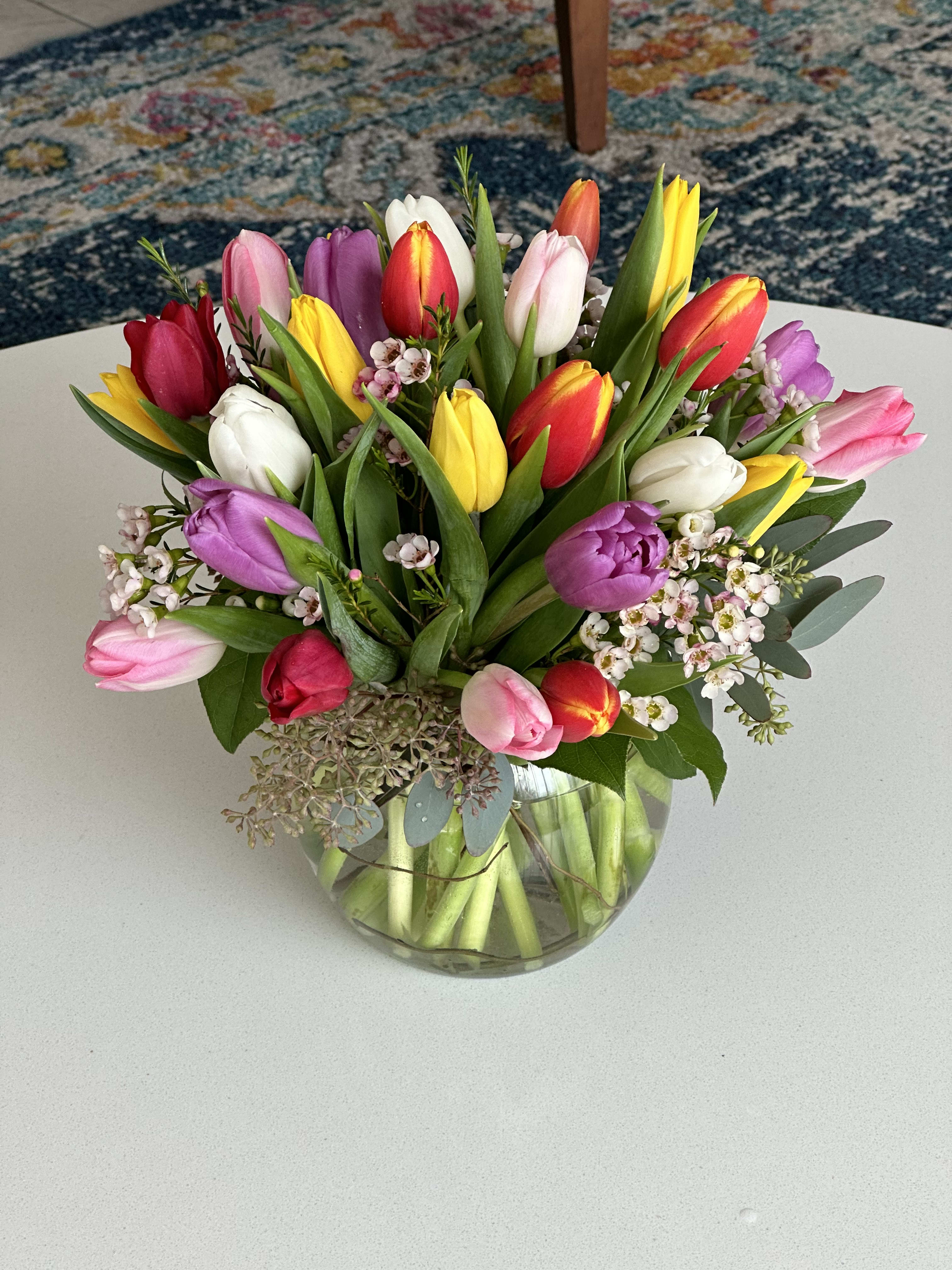 Radiant Tulips - Your choice of 20, 25, or 30 farm fresh tulips. Colors may vary but we will choose the best combination. (Deluxe size of 25 tulips shown in photo)