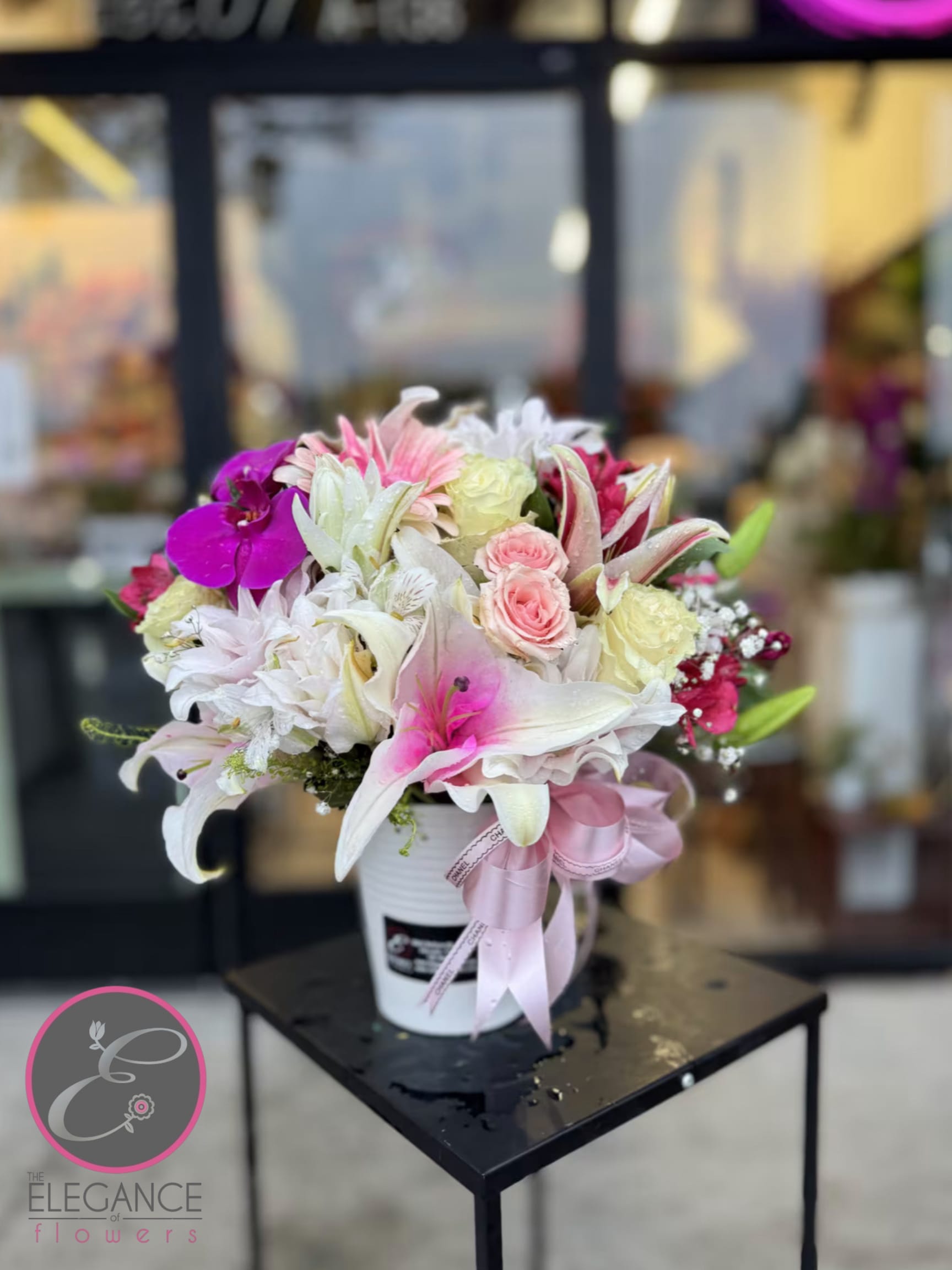Vase Arrangement #10 Vase Arrangement #10 - Enhance any space with our sophisticated flower arrangements in vases from Elegance Flowers. Each arrangement blends seasonal blooms with classic favorites in exquisite vases, perfect for home, office, or special events. Crafted for longevity and visual appeal, our designs add a touch of elegance and charm, making them ideal for gifting or personal enjoyment.
