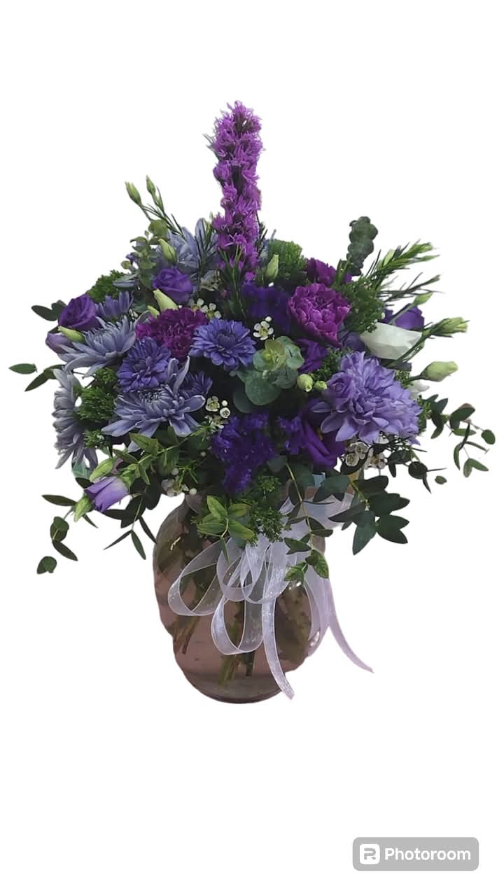 Violet Dreamscape - Introducing &quot;Violet Dreamscape&quot; – a mesmerizing vase arrangement that brings the enchanting hues of violet and blue to life! This stunning floral masterpiece, filled with lush greenery and delicate fillers, is perfect for brightening up any space. Elevate your decor and let the beauty of nature bloom in your home!
