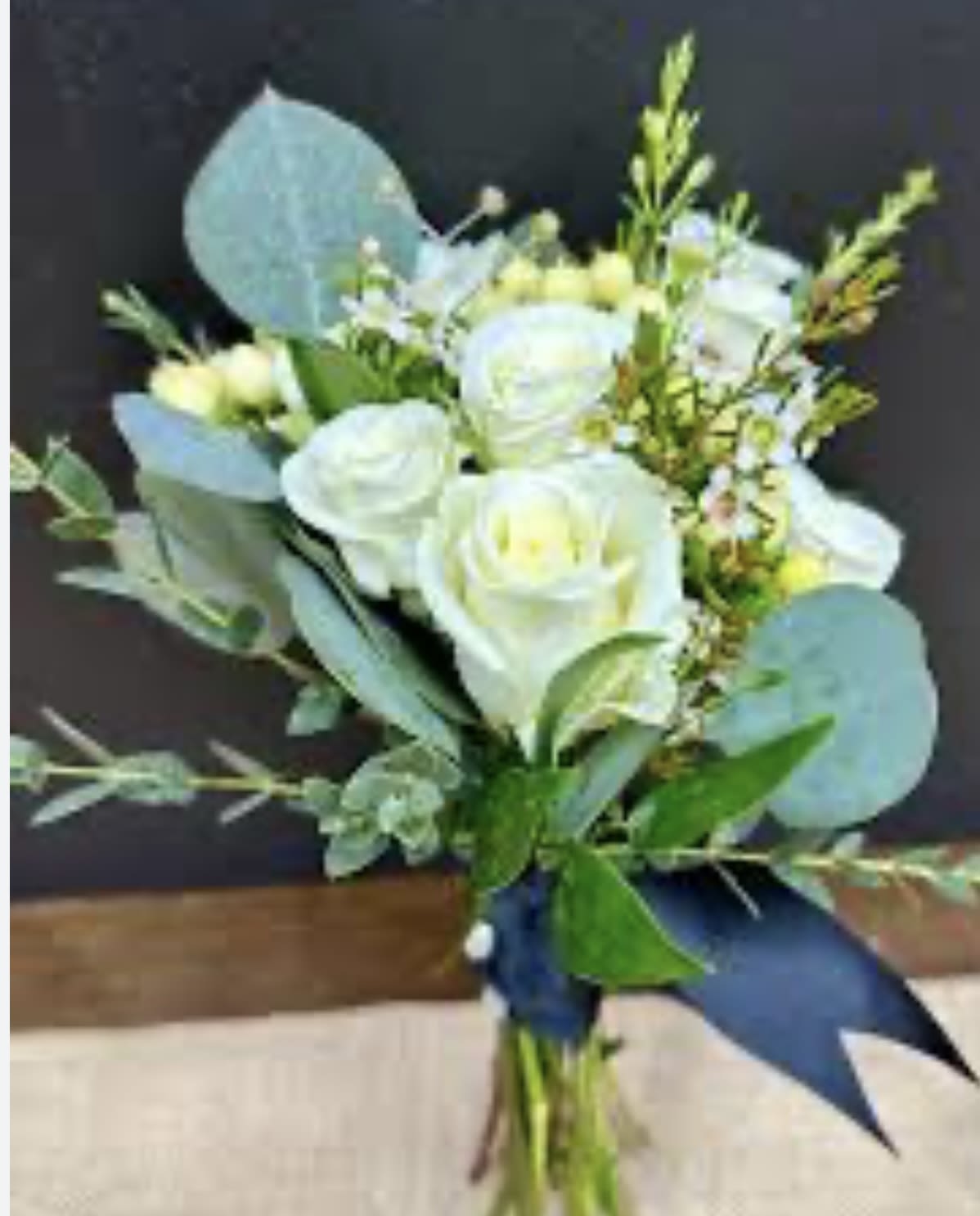 Nose gay Nose gay - Stunning white florals with lush greens ribbon can be any color you choose