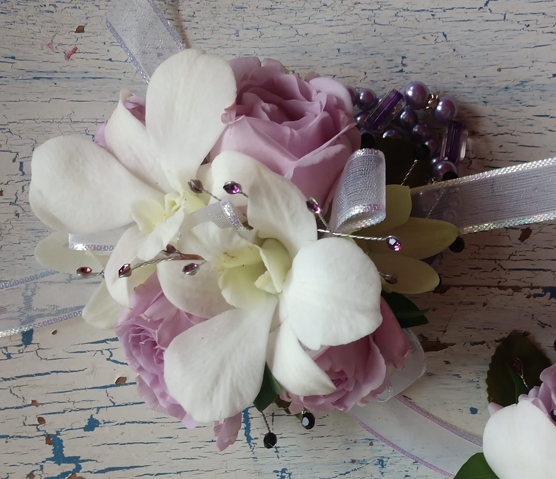 Flirty Wrist Corsage - So shy and flirty this soft lavender and white combination.  *Lavender pearl wristlet included in corsage cost.