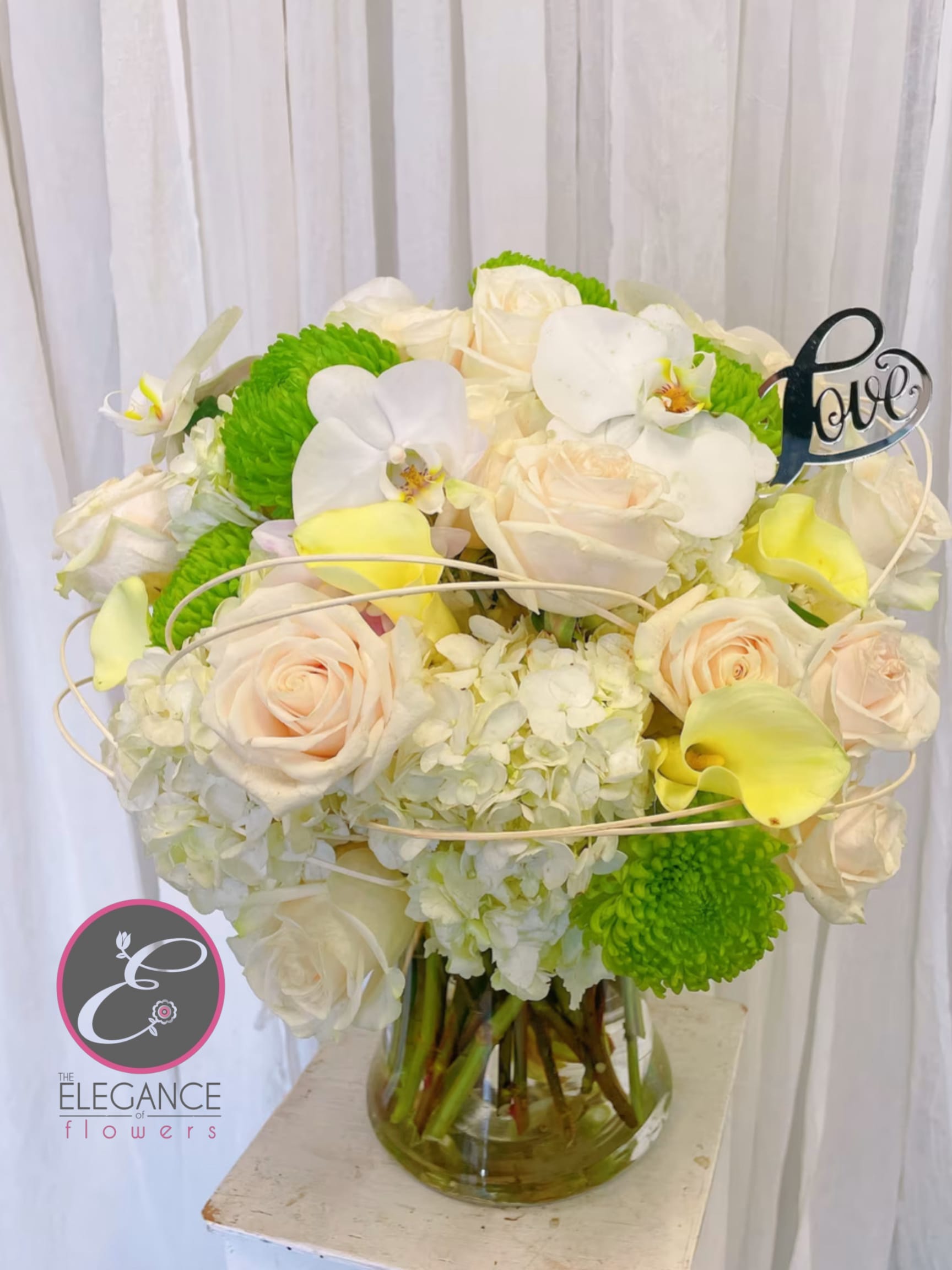 Vase Arrangement #5 Vase Arrangement #5 - Enhance any space with our sophisticated flower arrangements in vases from Elegance Flowers. Each arrangement blends seasonal blooms with classic favorites in exquisite vases, perfect for home, office, or special events. Crafted for longevity and visual appeal, our designs add a touch of elegance and charm, making them ideal for gifting or personal enjoyment.