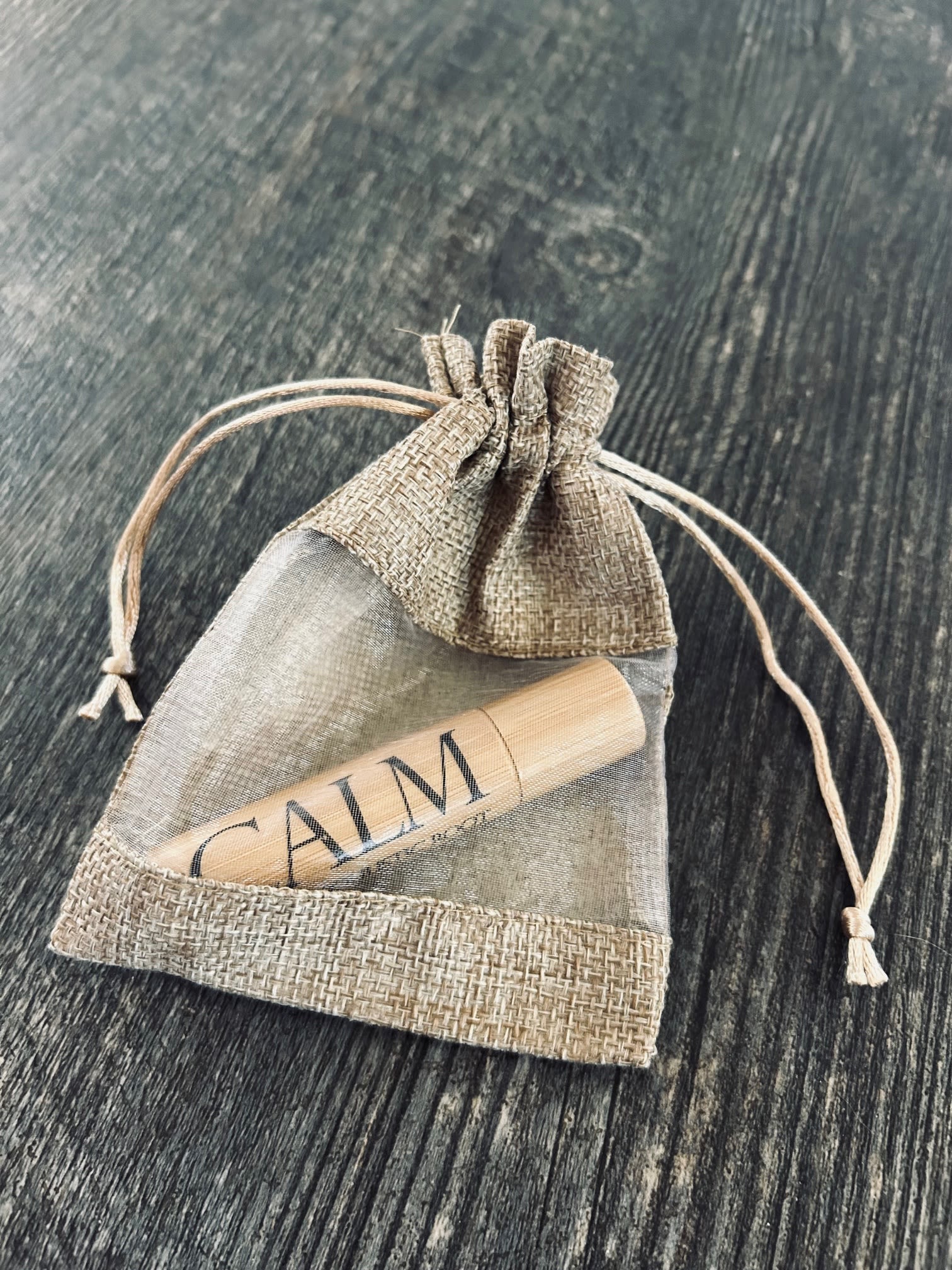 CALM Essential Oil Rollerball - A special touch to any flower delivery! One CALM essential oil rollerball packaged in a small cloth pouch.