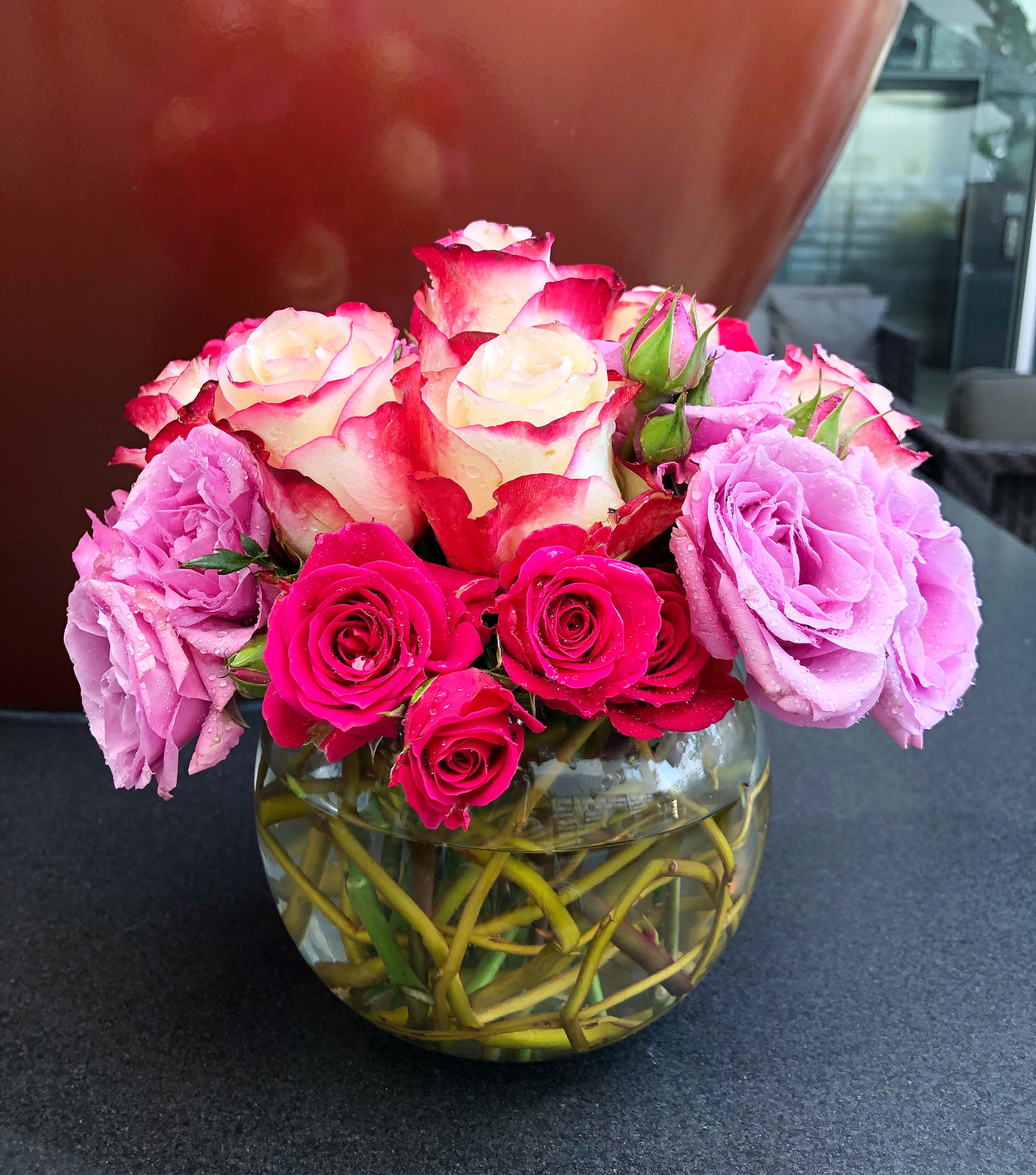 Lifetime Love - A bouquet to symbolize a lifetime of love and happiness!  Order this lovely centerpiece arrangement filled with all roses delicately arranged in a keepsake bubble vase.  Approximately 10&quot; D