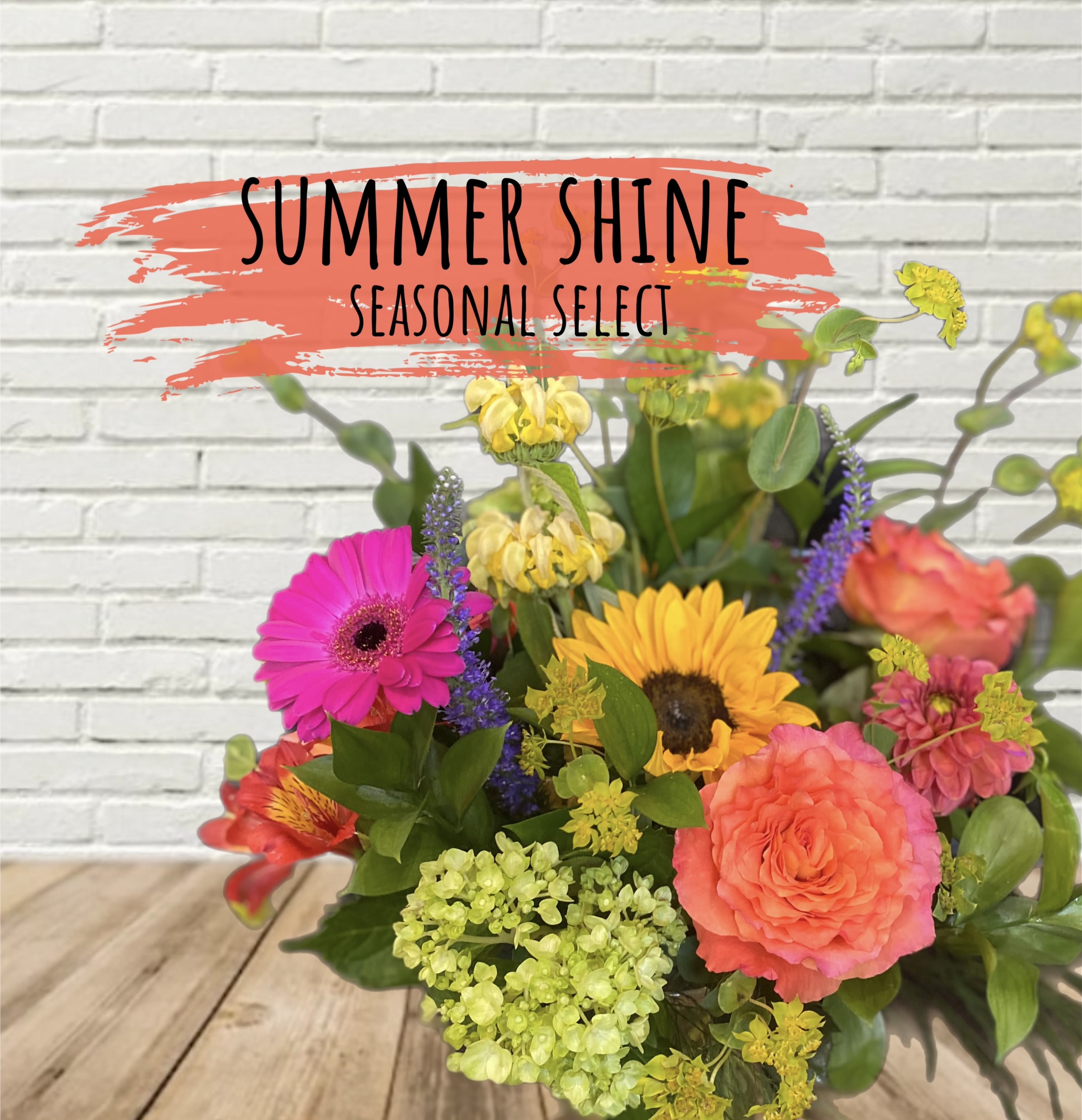 Summer Shine Designer Select Summer Shine Designer Select - A bright summer seasonal arrangement! This is created in a standard glass vase, and each arrangement is created specific for your order therefore may vary from the example arrangement.