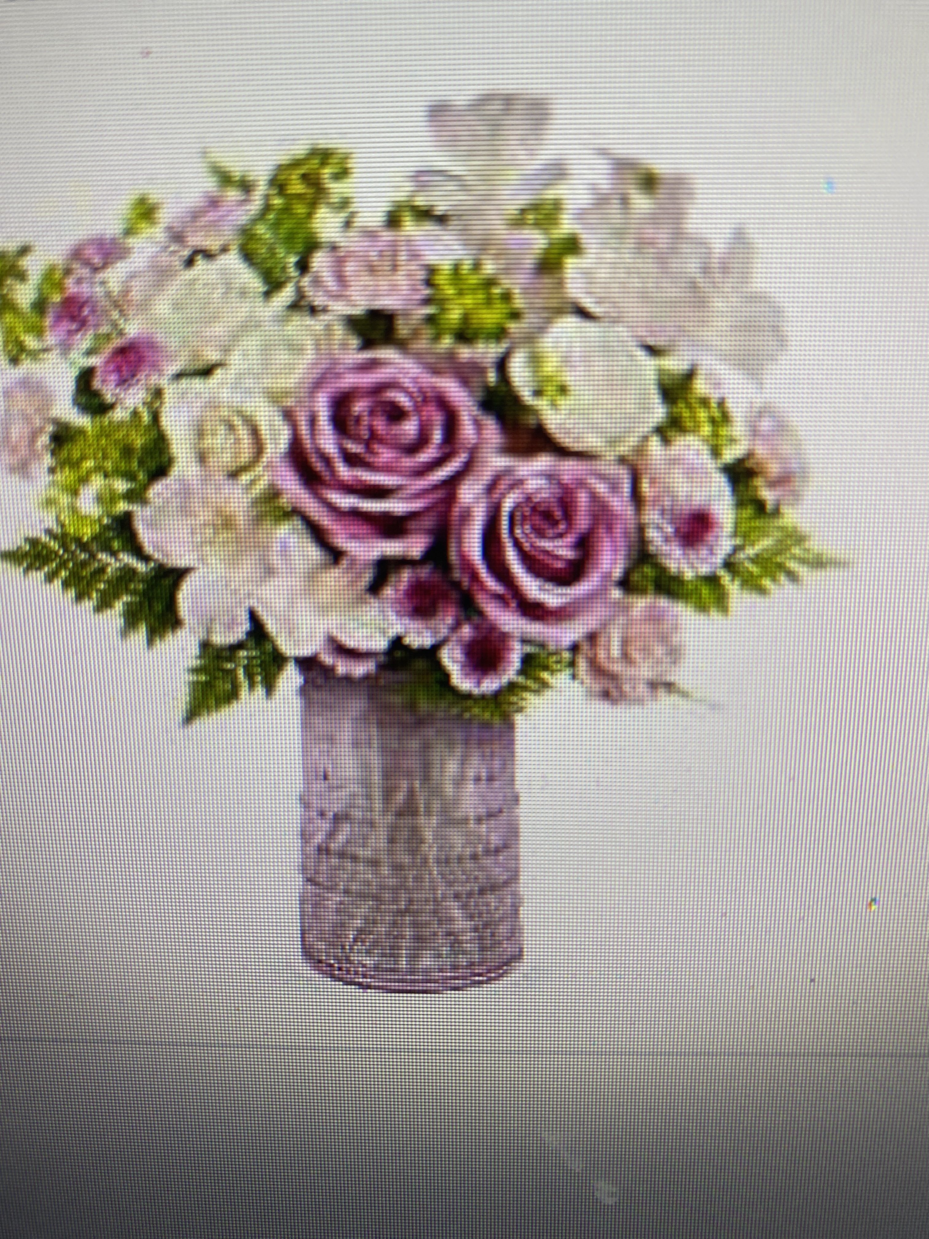 Blush blossoms Blush blossoms - Celebrate Mom's love for elegant design with the Blush Blossoms Bouquet arranged in a pink glass carafe, featuring delicate beaded details and meeting FDA tableware standards for safely serving and storing drinks. Perfect for showcasing fresh blooms, this timeless keepsake adds a touch of beauty to her home year-round 2 each roses, 50cm, lavender | 1 stem roses, spray, creme | 2 stems alstroemeria, light pink | 2 stems carnations, miniature, pink | 2 stems chrysanthemums, button spray, purple | 1/2 stem bupleurum | 2 stems leatherleaf fern