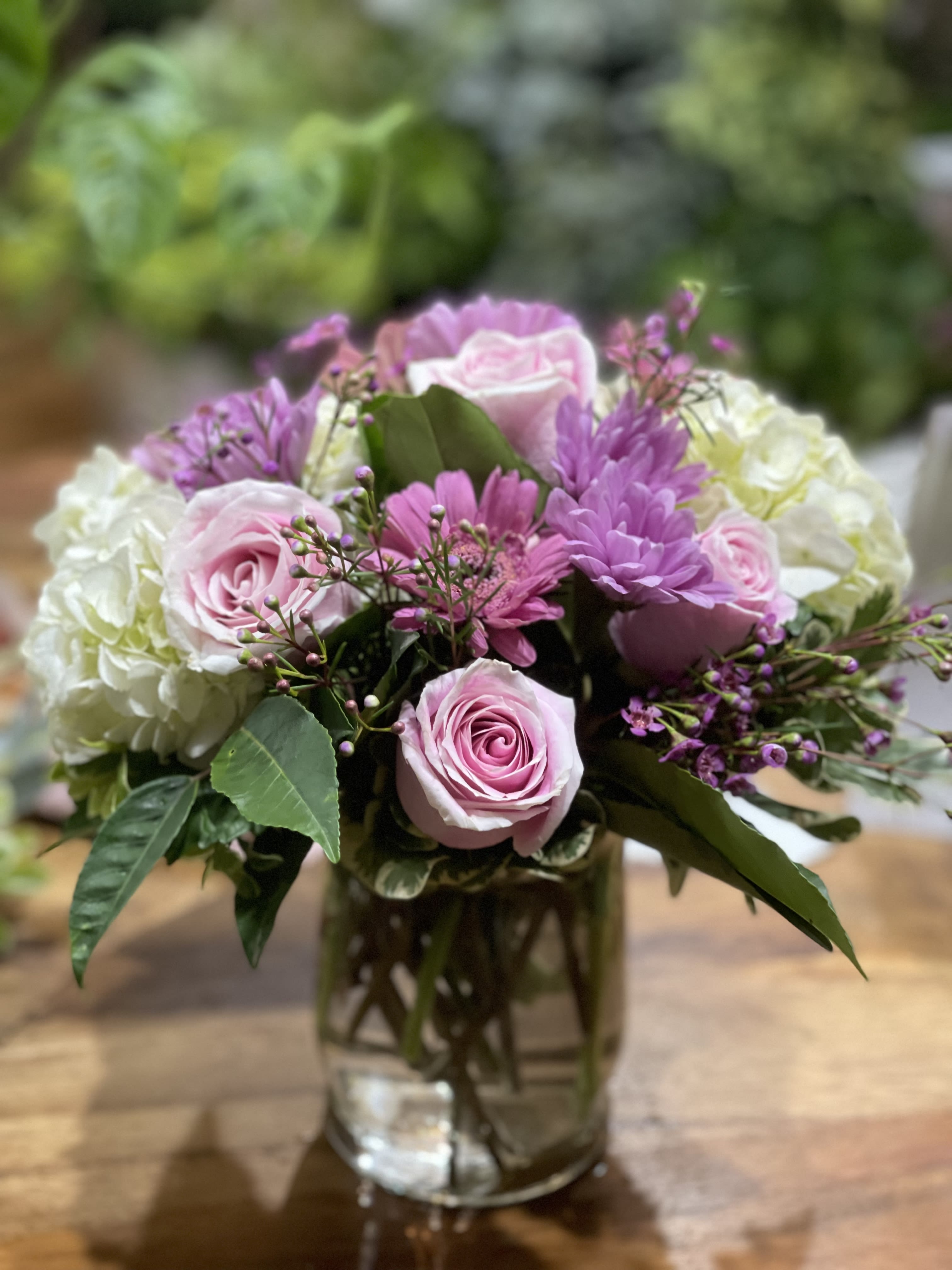 Lovely  - Sweet, soft, cheerful. A sweet and lovely floral arrangement of purple, pink and white flowers are sure to brighten the day.   Perfect flowers for birthdays, &quot;get well soon,&quot; new baby, sympathy, congratulations, romantic gestures, and &quot;Thank you.&quot; Also a beautiful wedding palette.  Available for delivery in Seattle, Bellevue, Shoreline, and surrounding areas. Available for delivery in all neighborhoods in Seattle including Magnolia, Ballard, Fremont, Downtown, Queen Anne, Crown Hill, U District, West Seattle, International District, Capitol Hill, Pioneer Square, Beacon Hill, Columbia City, Georgetown, etc. 