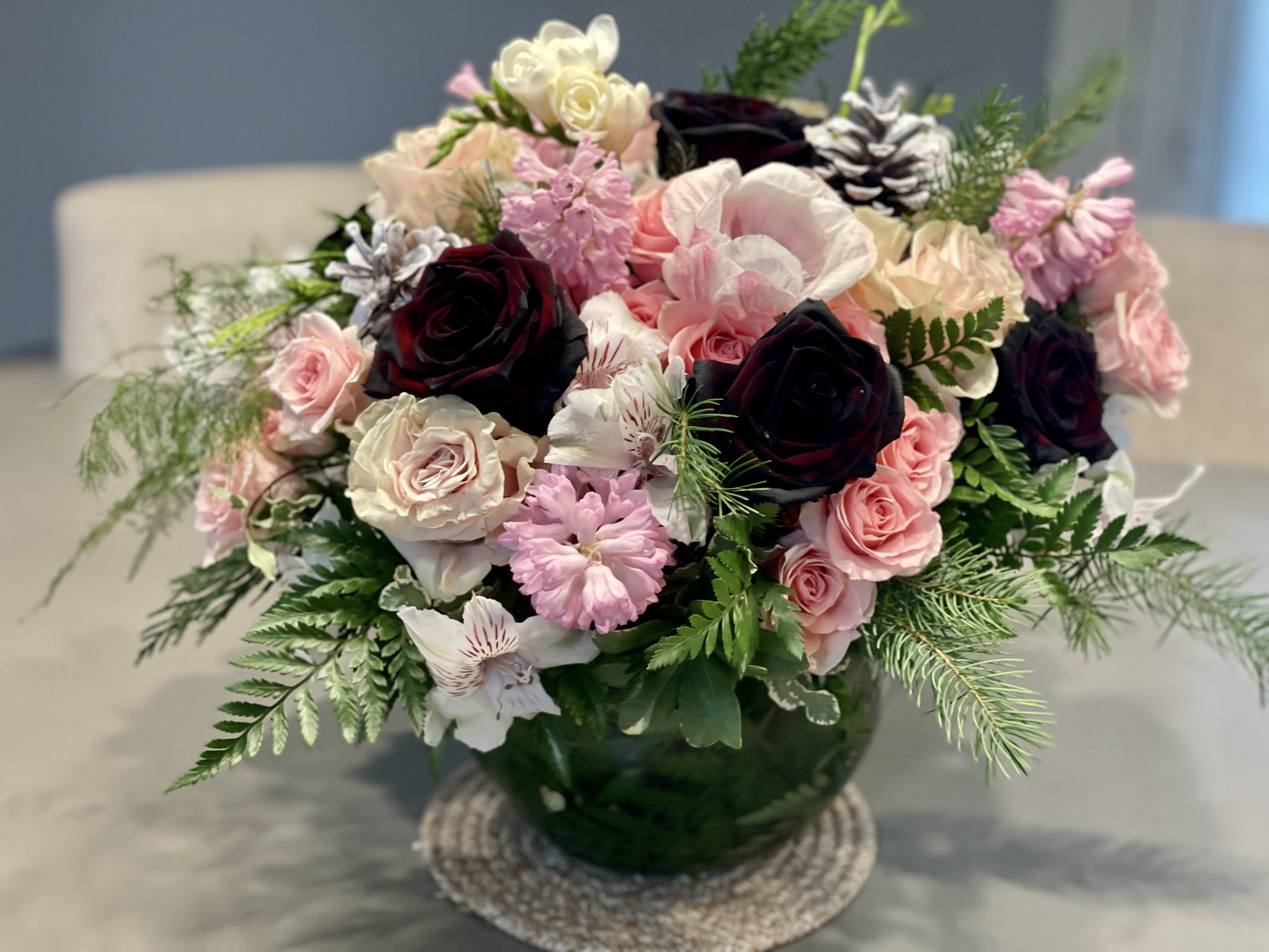 The Melrose The Melrose - Pinks, nudes and noir blooms in a large bubble bowl. Pure sophistication. Perfect flowers for birthdays, "get well soon," congratulations, romantic gestures, and "Thank you." Also a beautiful wedding palette. Available for delivery in Seattle, Bellevue, Shoreline, and surrounding areas. Available for delivery in all neighborhoods in Seattle including Magnolia, Ballard, Fremont, Downtown, Queen Anne, Crown Hill, U District, West Seattle, International District, Capitol Hill, Pioneer Square, Beacon Hill, Columbia City, Georgetown, etc.