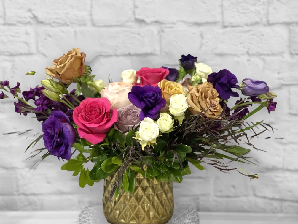 Venice Venice - Purple and bright pink blooms with toffee roses. Perfect flowers for birthdays, "get well soon," congratulations, romantic gestures, and "Thank you." Available for delivery in Seattle, Bellevue, Shoreline, and surrounding areas. Available for delivery in all neighborhoods in Seattle including Magnolia, Ballard, Fremont, Downtown, Queen Anne, Crown Hill, U District, West Seattle, International District, Capitol Hill, Pioneer Square, Beacon Hill, Columbia City, Georgetown, etc.