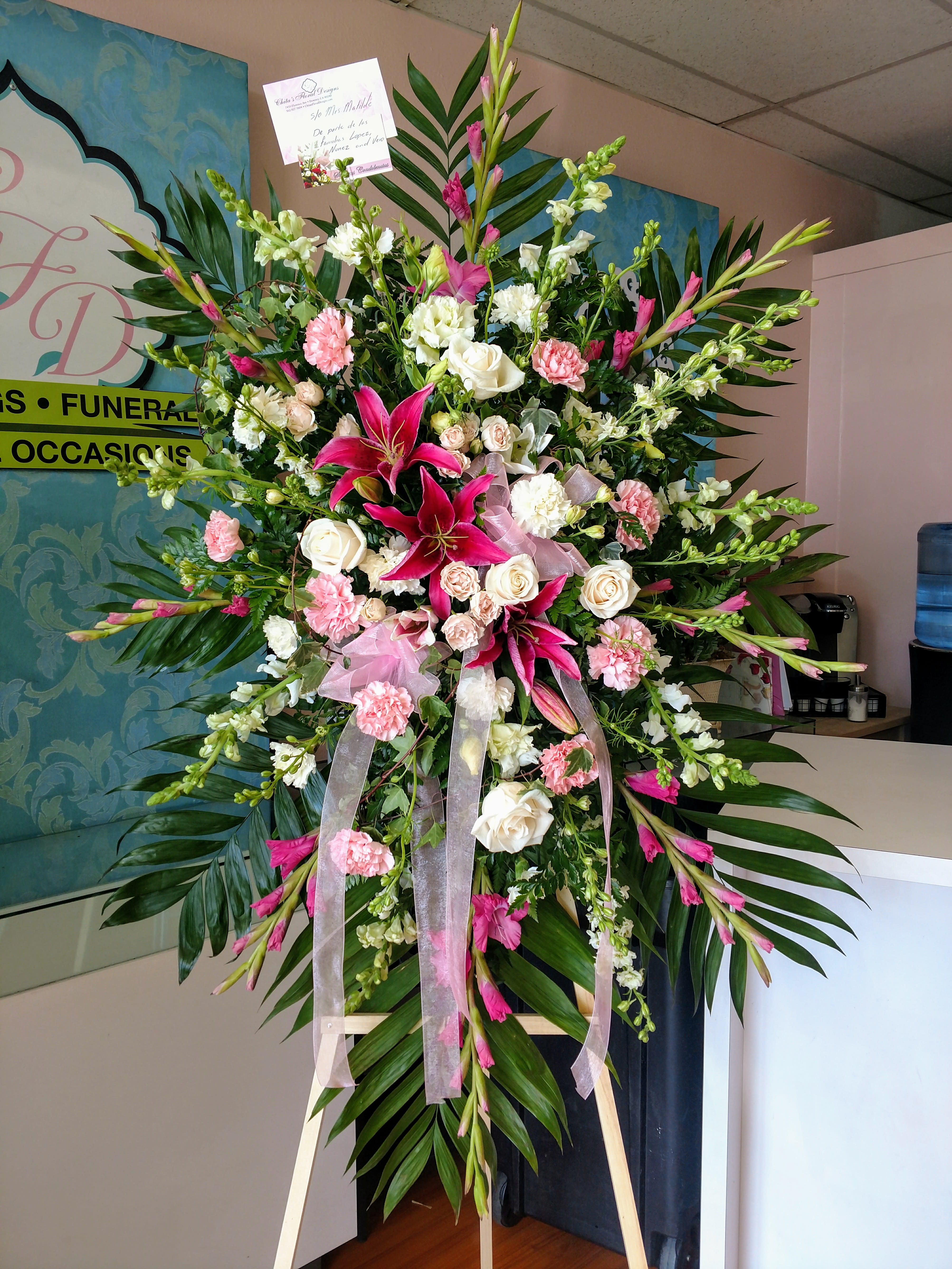 Eternal Love Standing Spray Eternal Love Standing Spray - Tall spray measure over 6ft tall and has a perfect mixture of all pink gladiola, snap dragon, larkspur, roses, lilies, carnations and foliage.