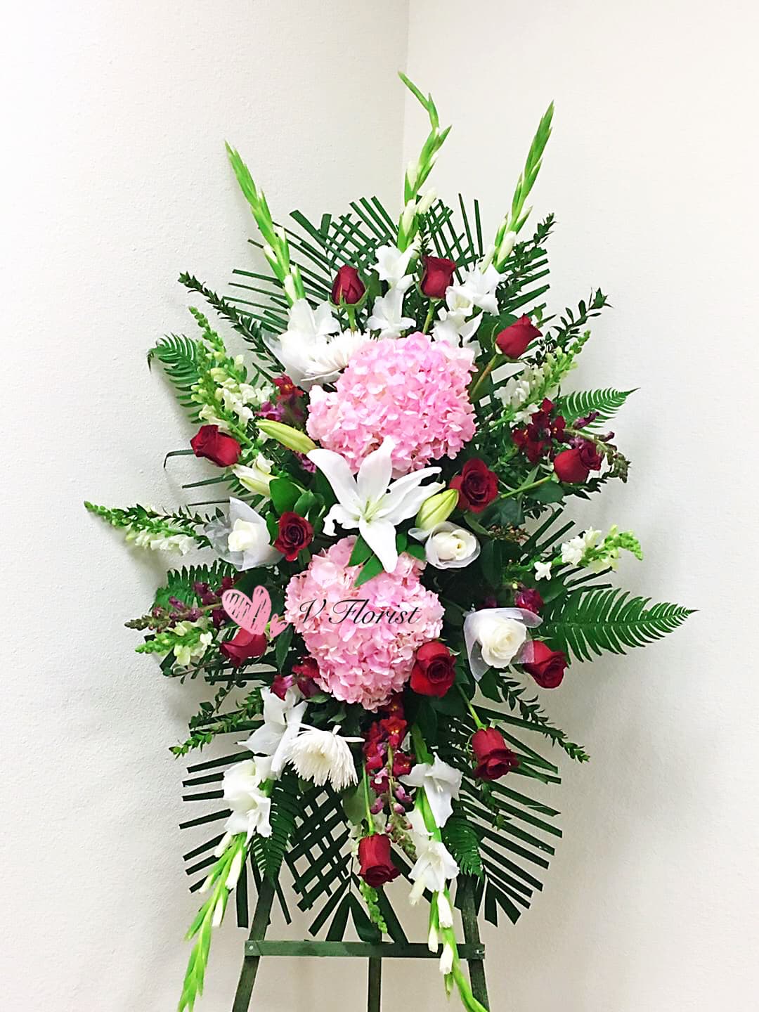 Sincere Thought Sympathy Spray with Pink Hydrangeas C8 Sincere Thought Sympathy Spray with Pink Hydrangeas C8 - Take a walk through the garden of memories with this lush spray of red, pink and white blooms, accented with fresh green leaves. It's a joyful expression of sympathy sure to be appreciated. Our florists hand-design each arrangement, so colors and assortment may vary based on local availability Orders must be placed three days in advance to allow for processing