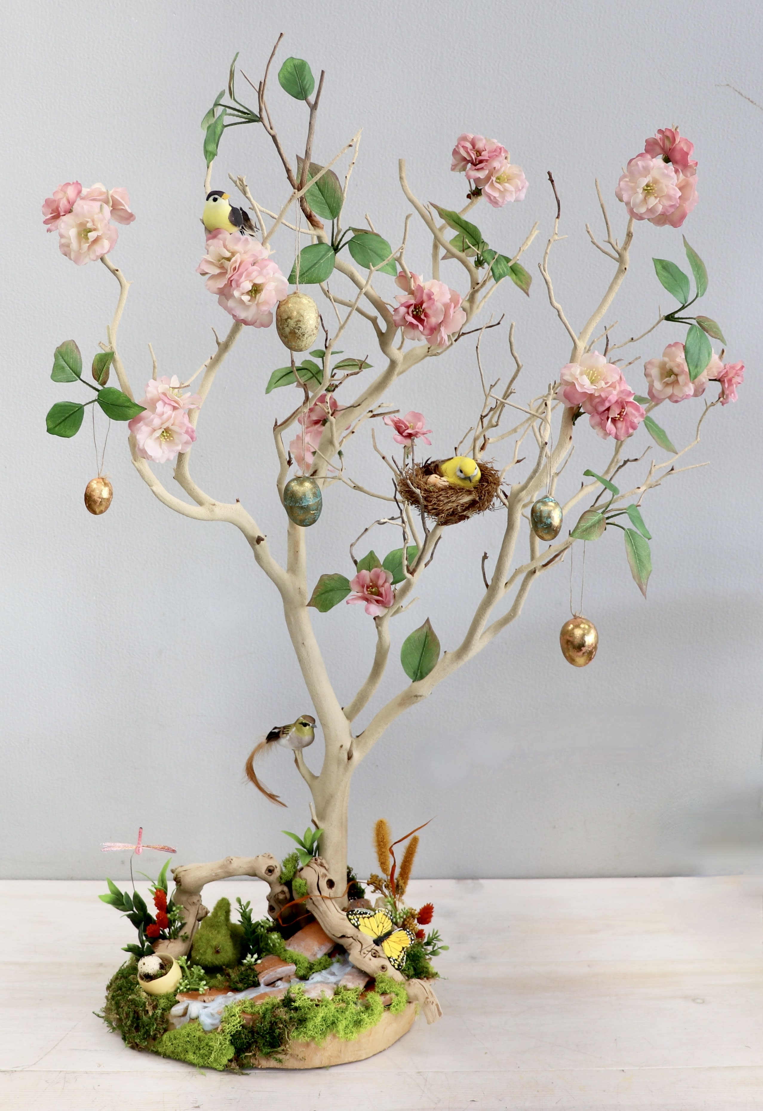 Easter Egg Tree - My Glendale Florist - An Easter egg tree is a spring decoration where painted eggs are hung on branches to signify new life and fertility. Our standard is approximately measuring at 3ft. Only 2 sizes available which is standard and premium. 