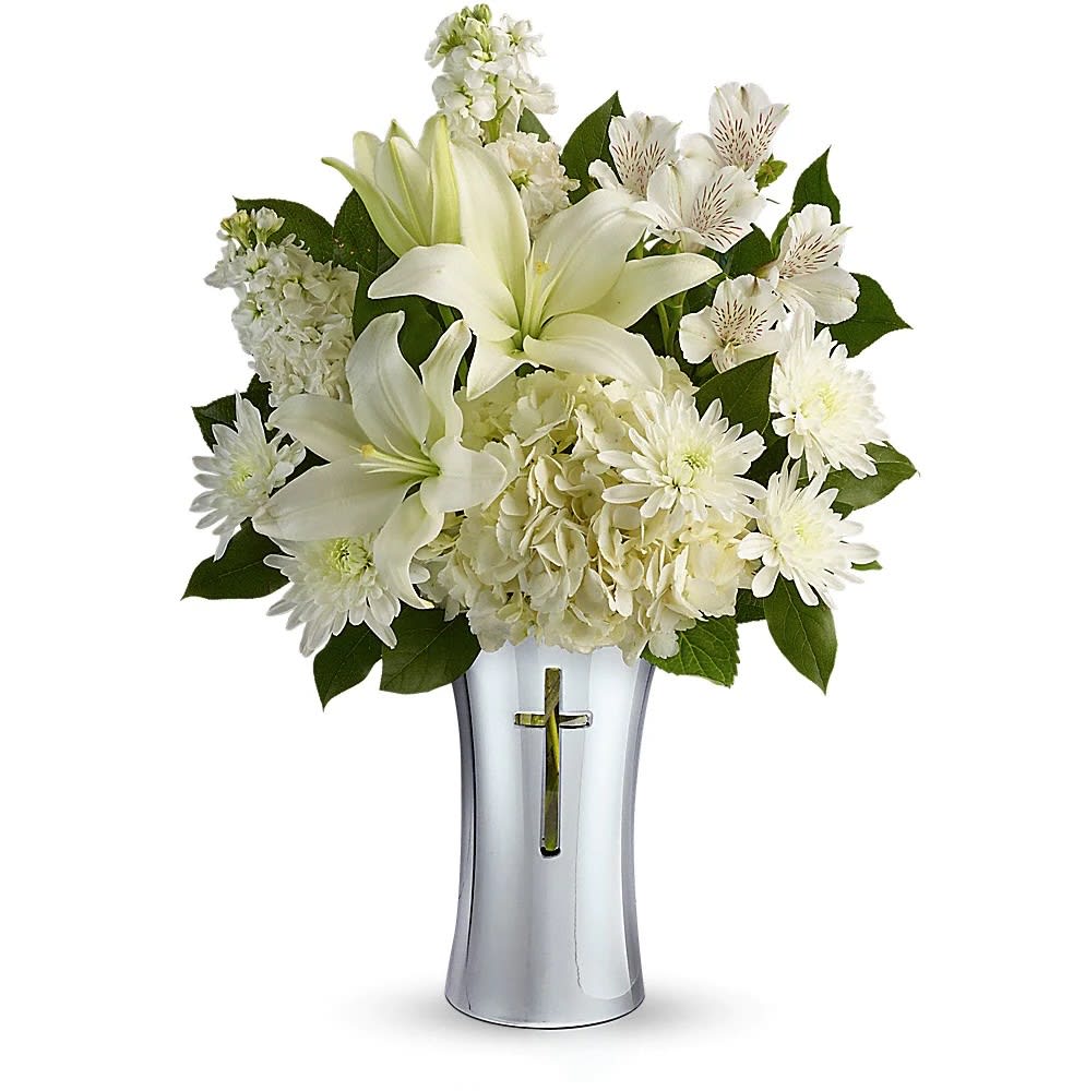 Shining Spirit Bouquet - A shining tribute to a life well lived, this pure white bouquet of hydrangea and lilies is arranged in a beautiful ceramic vase with gleaming metallized finish and reverent cross cut-out. It's a lovely gift of remembrance for the home or service.