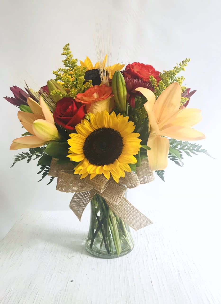 Get Well #3 - Arrangement of fresh cut flowers designed in a glass vase. Colors can be modified depending on availability.