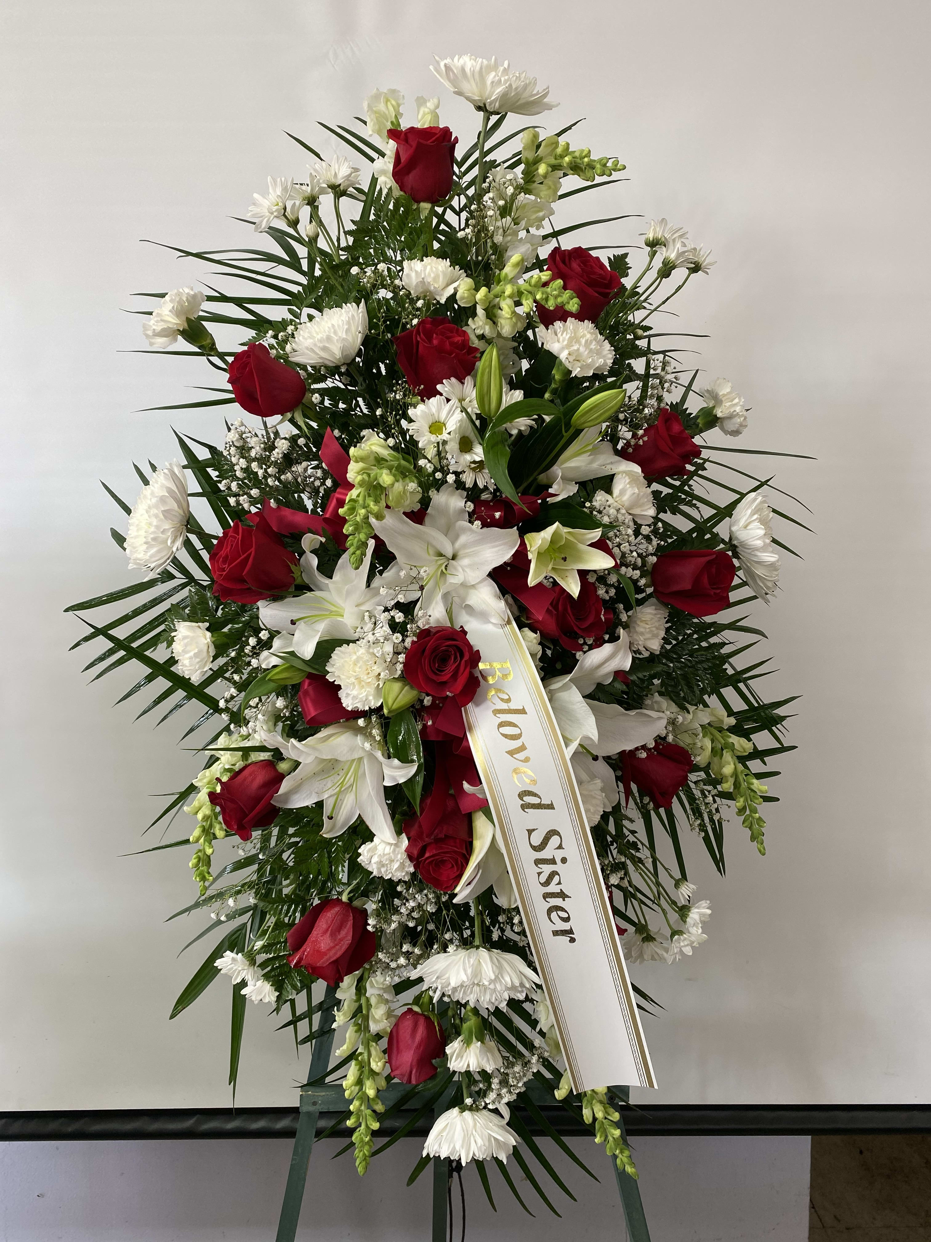 Sympathy Standing Spray #33 Sympathy Standing Spray #33 - Standing spray arrangement of fresh cut flowers. Designed on an easel which is included with arrangement and does NOT need to be returned. Banner is included with arrangement. Please specify what is to be printed on banner upon check out under "FLORIST INSTRUCTIONS". LIMITED TO 5 WORDS ON BANNER.