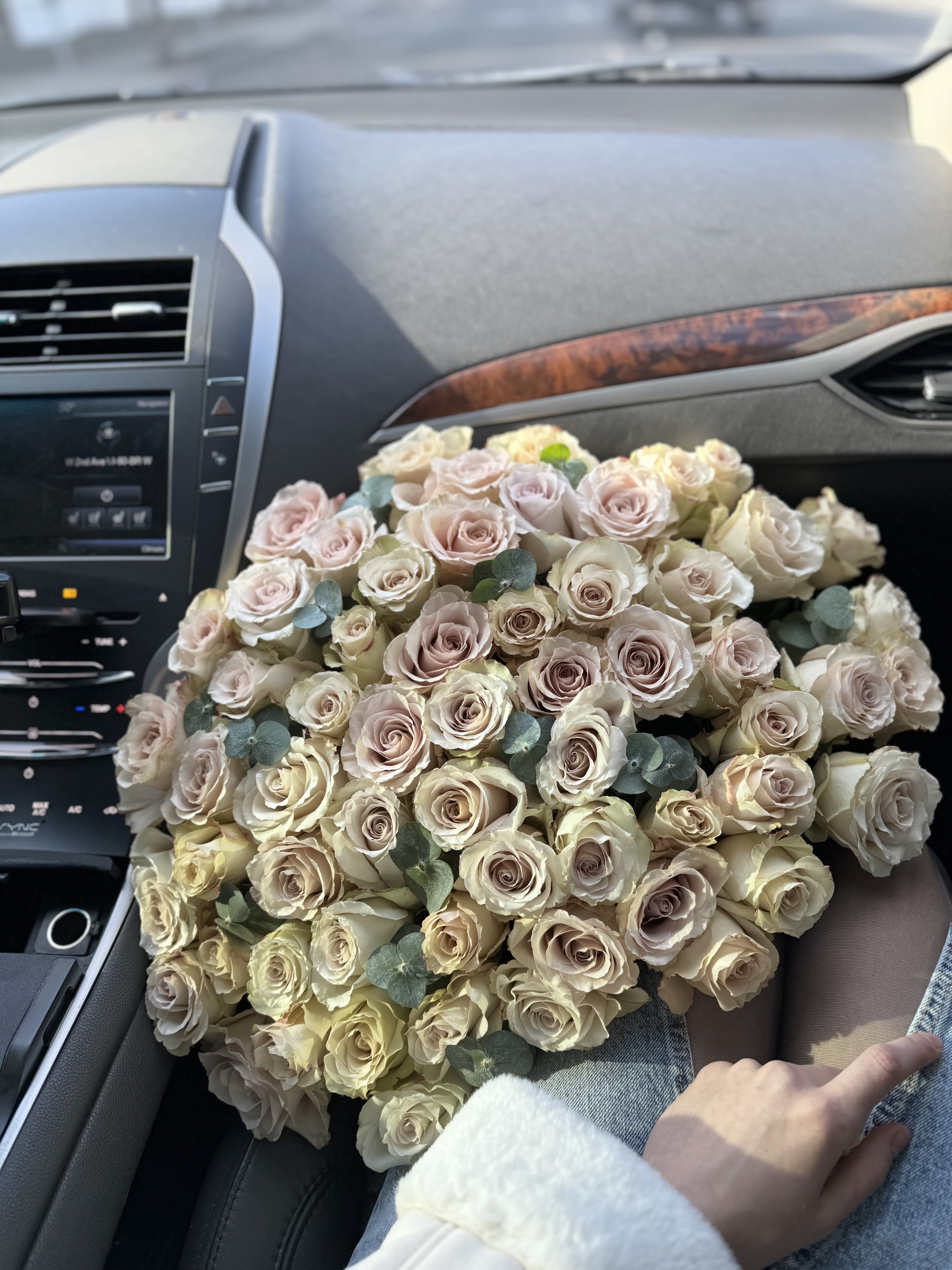 Unusual pink-purple roses with the addition of eucalyptus  - Unusual pink-purple roses with the addition of eucalyptus 