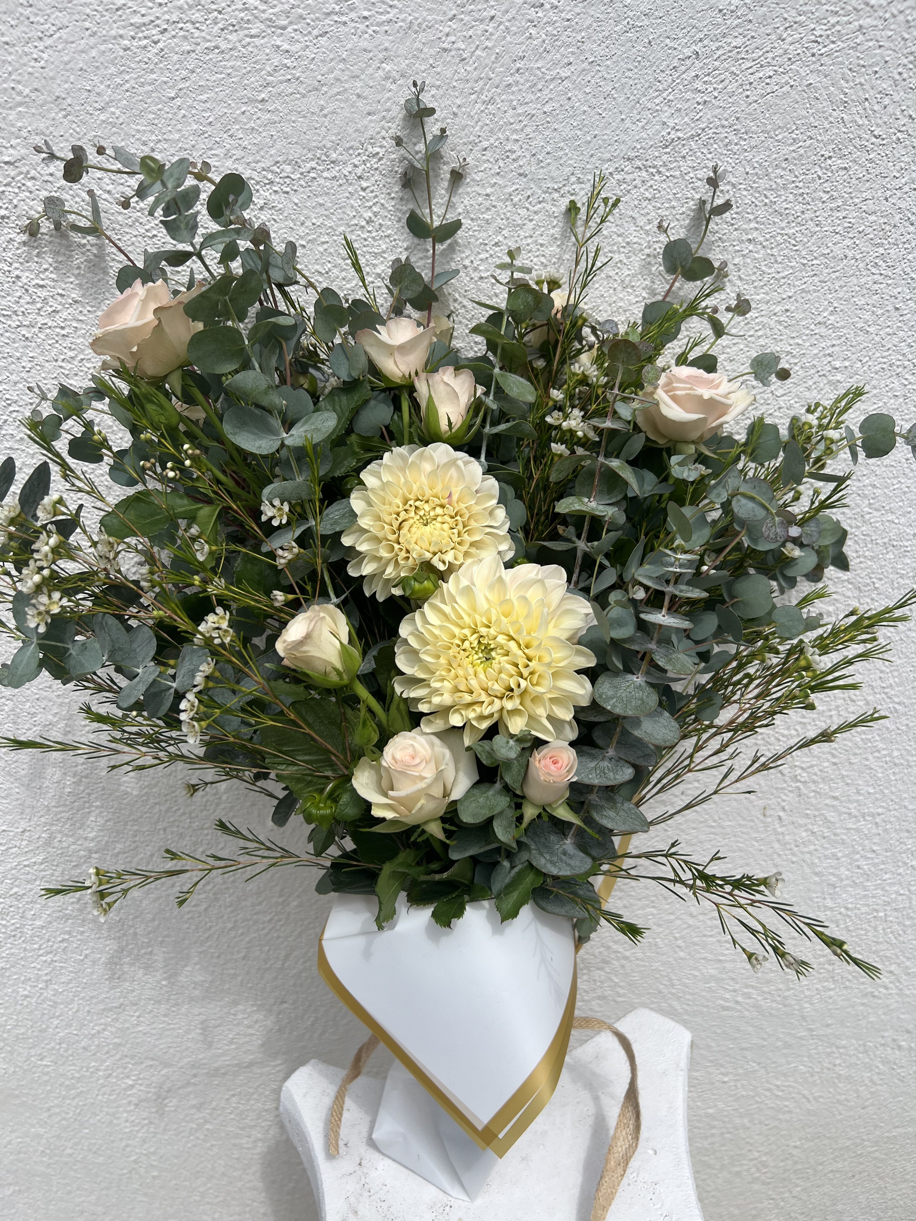 Sweet Dahlia Bouquet  - A classically gorgeous handtied bouquet with the highest quality Dahlia’s, Spray Roses, Waxflower, and two different kinds of Eucalyptus.   All Sunset Flor arrangements include a flower food package, a care card, and floral info sheet. 