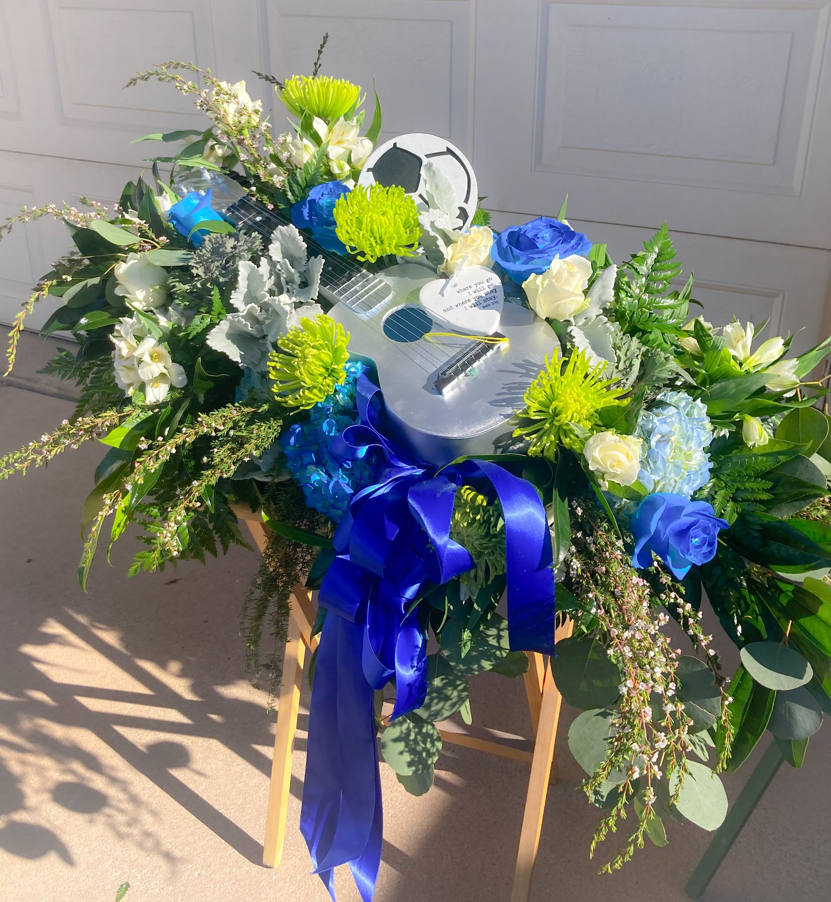 BLUE SONG CASKET SPRAY - A PERSONALIZED MUSICIANS CASKET SPRAY IN BLUES. 